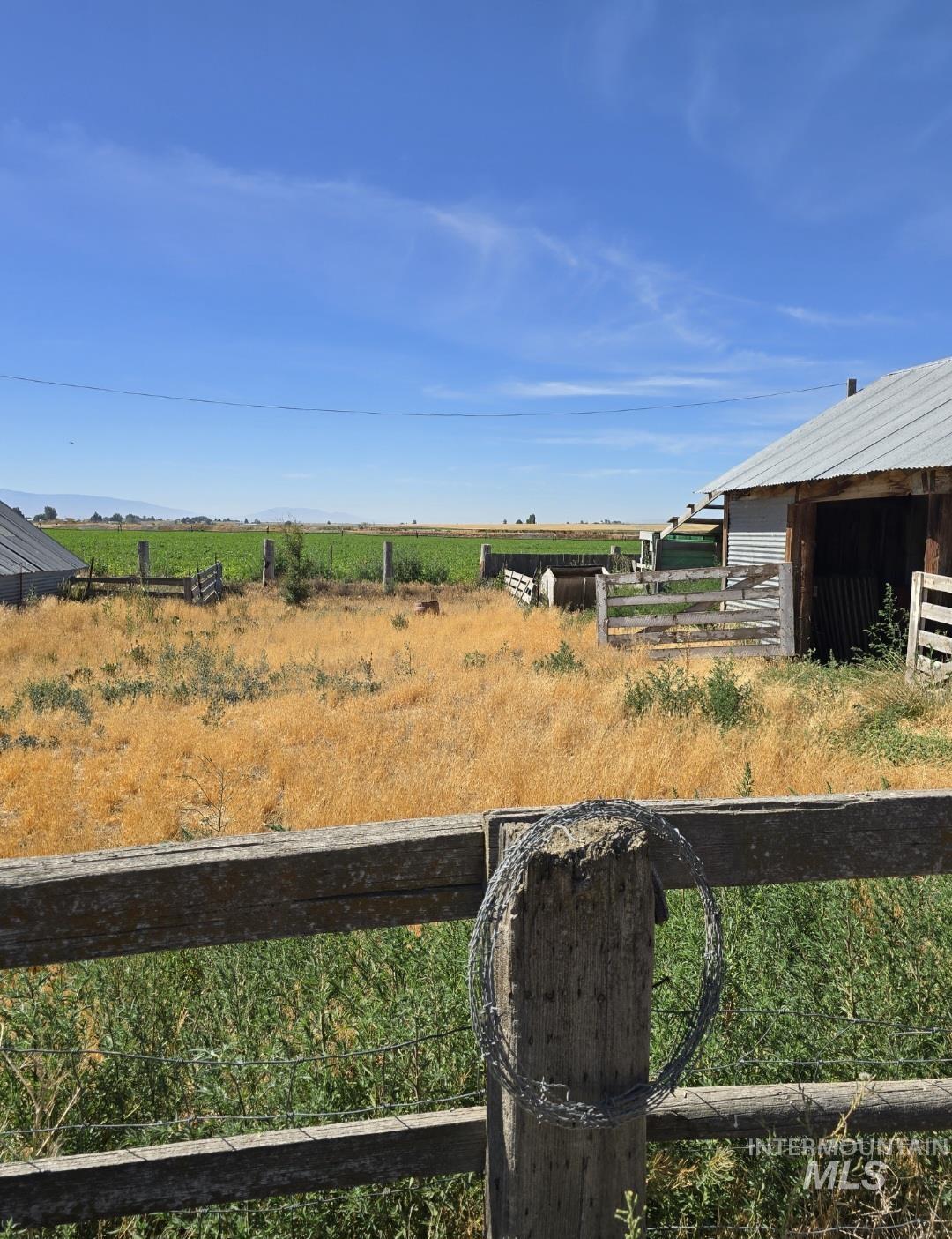 View of yard with a view of countryside