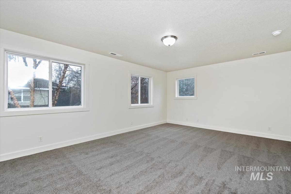 Enormous room lends itself to an office area at one end.