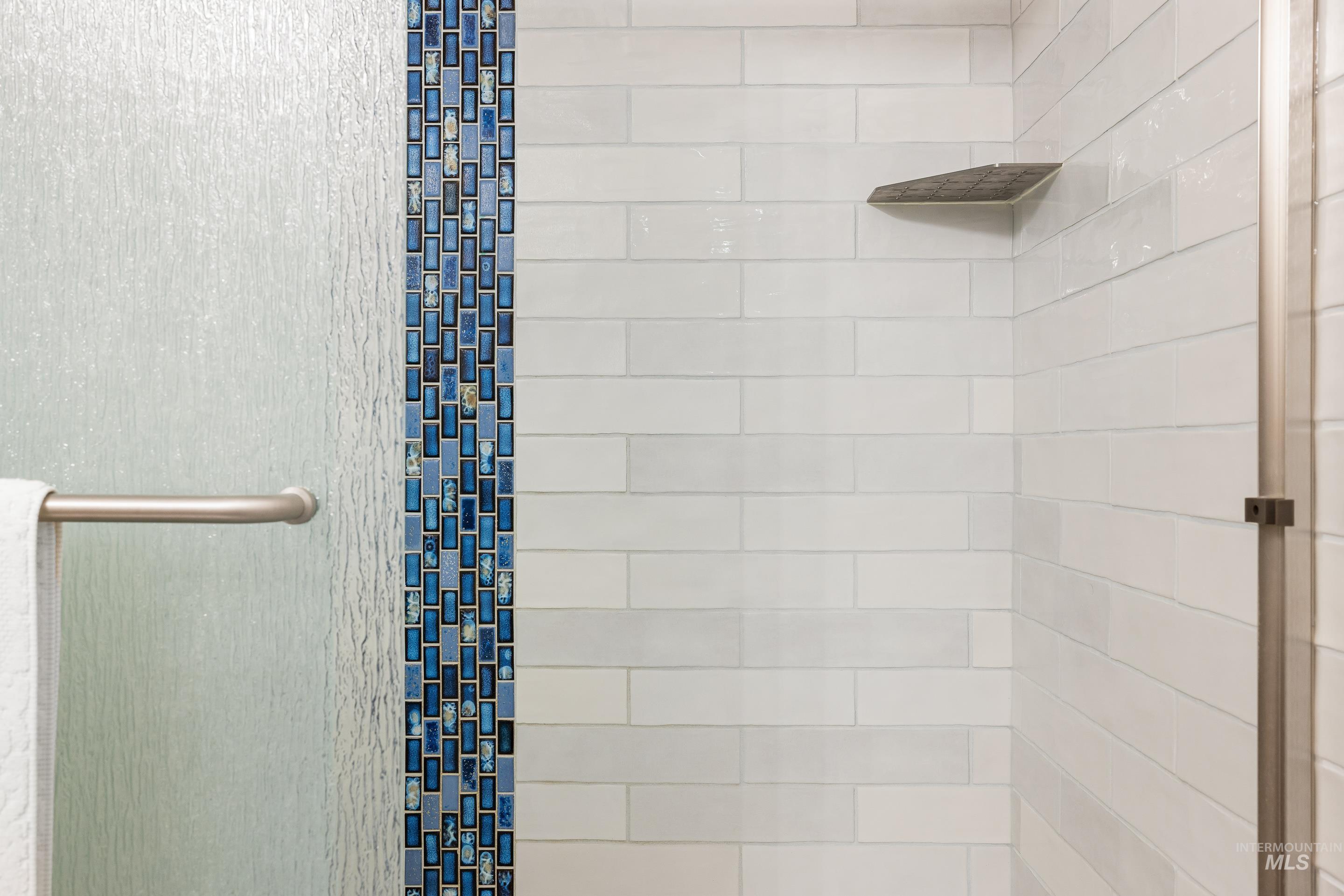 Full bathroom with tiled shower
