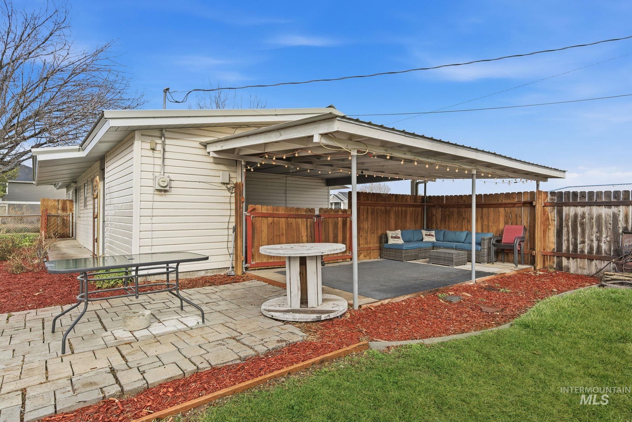 View of patio with an outdoor living space