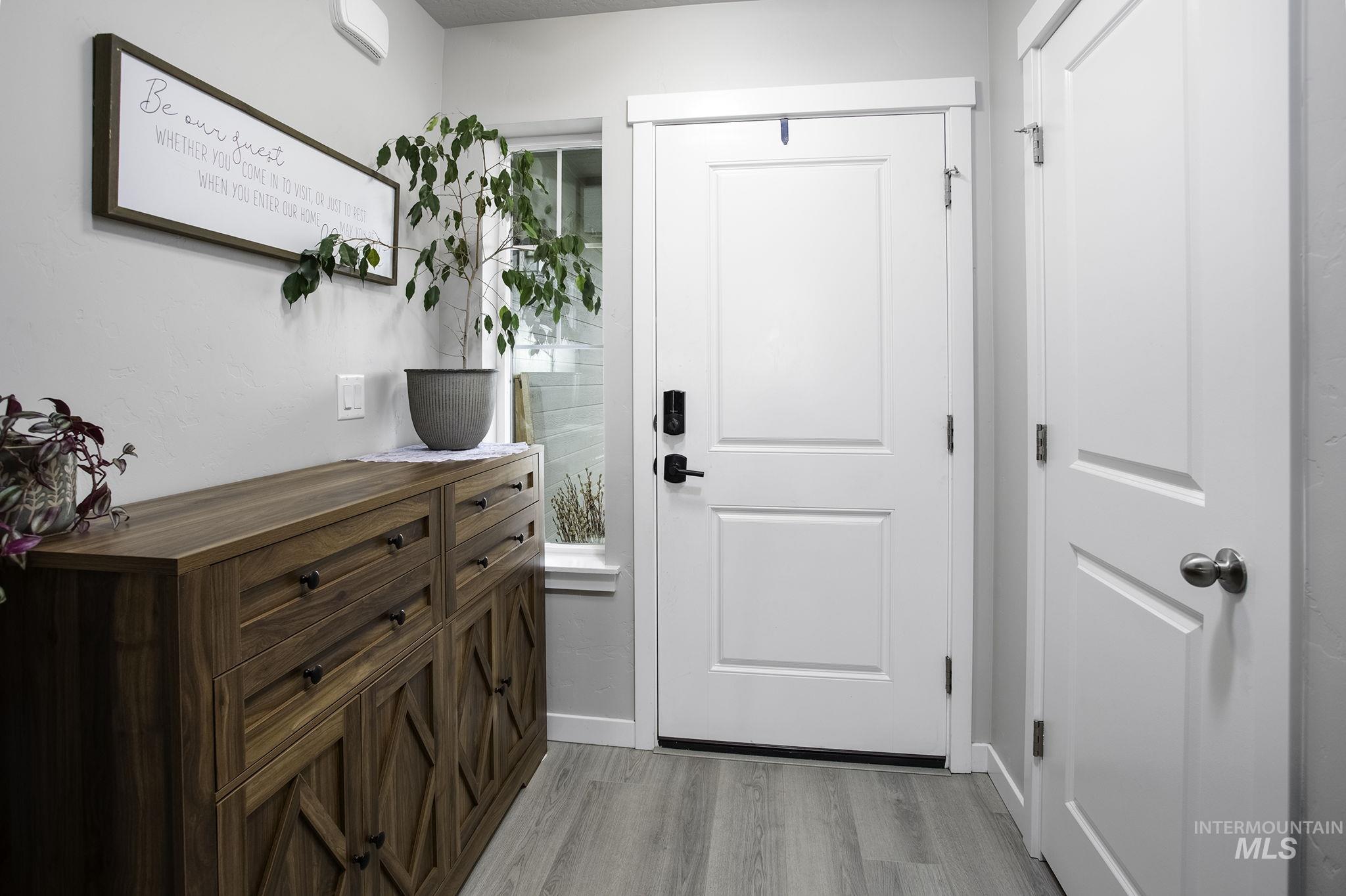 Entryway featuring wood finished floors