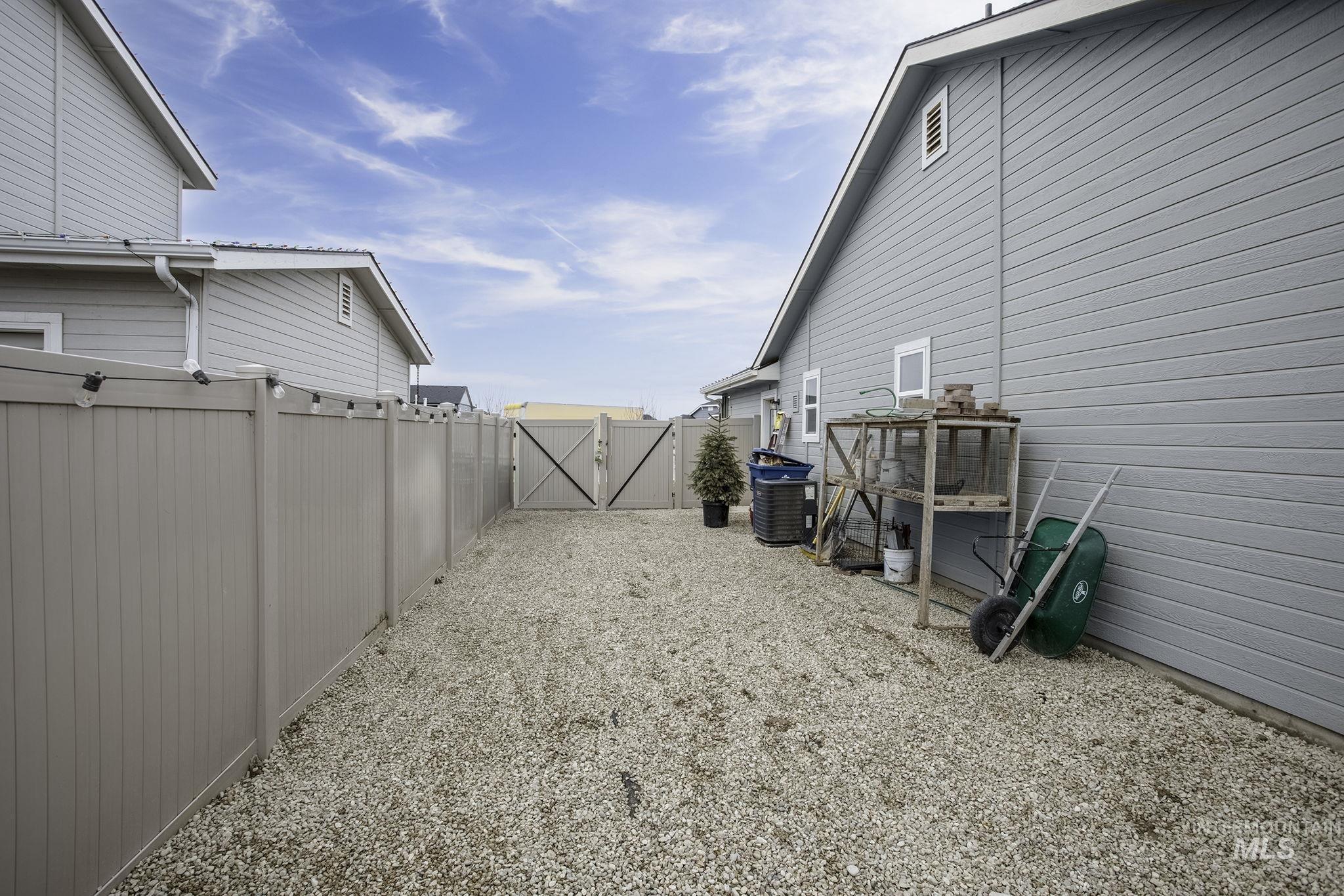 View of yard featuring a gate