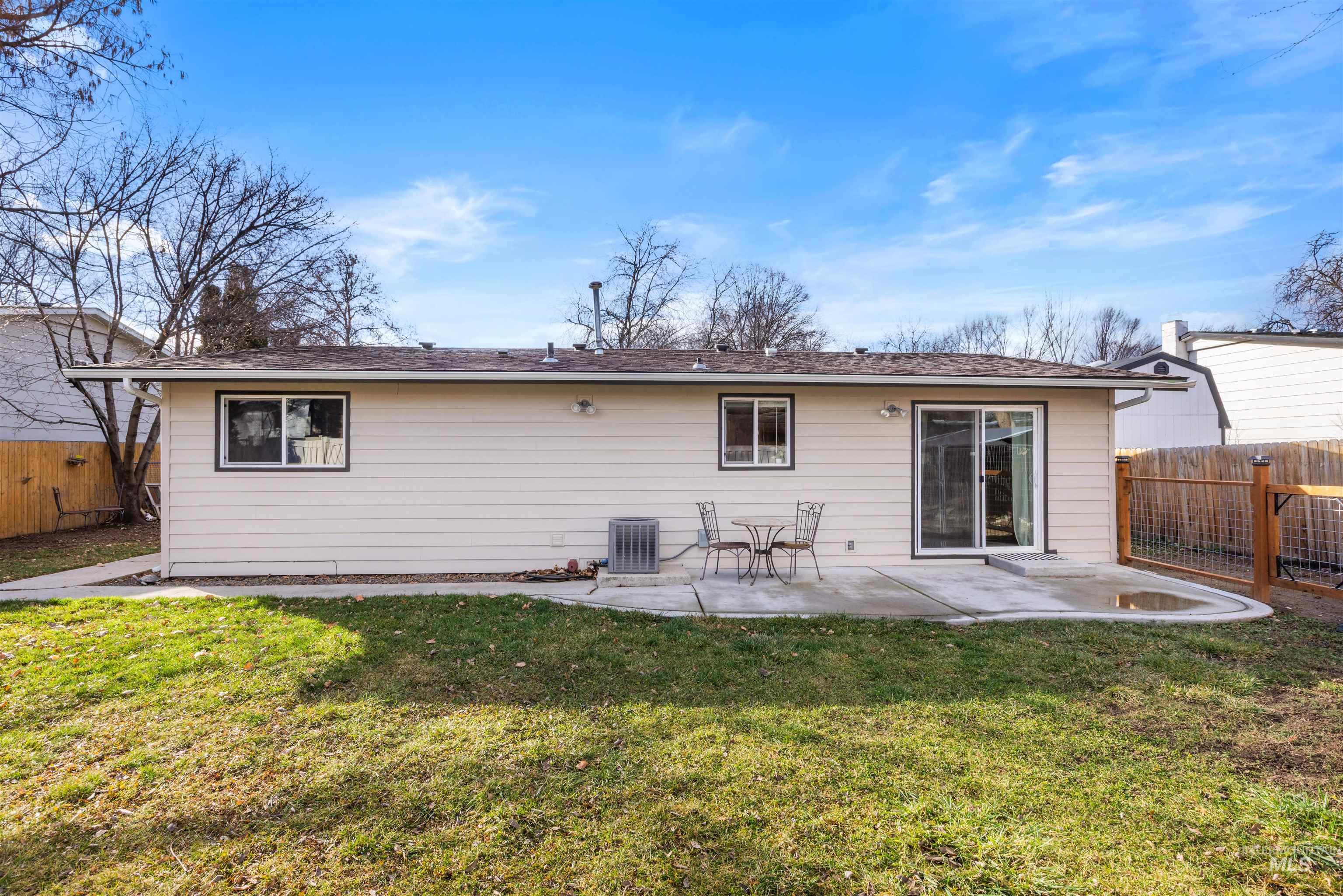 Rear view of house featuring a patio area