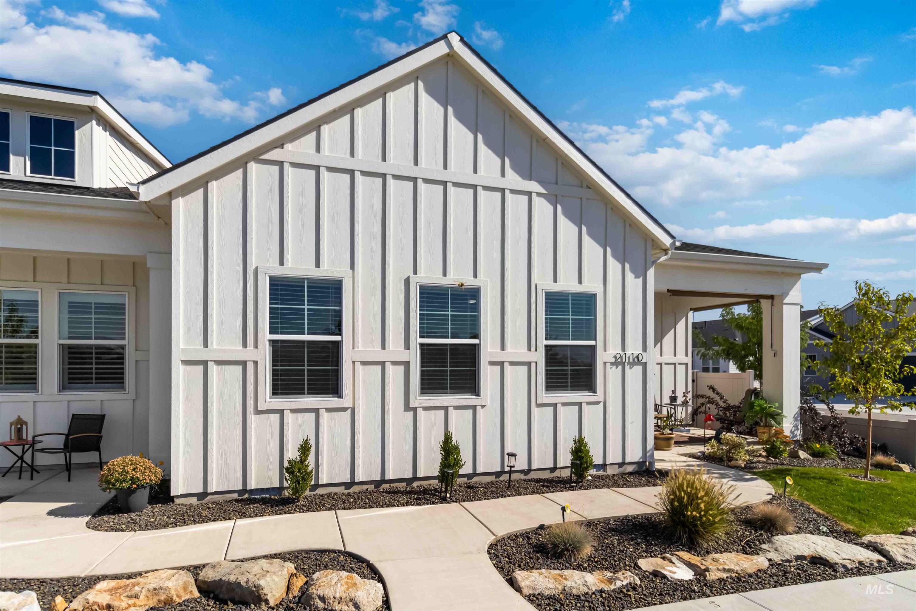 View of property exterior featuring board and batten siding