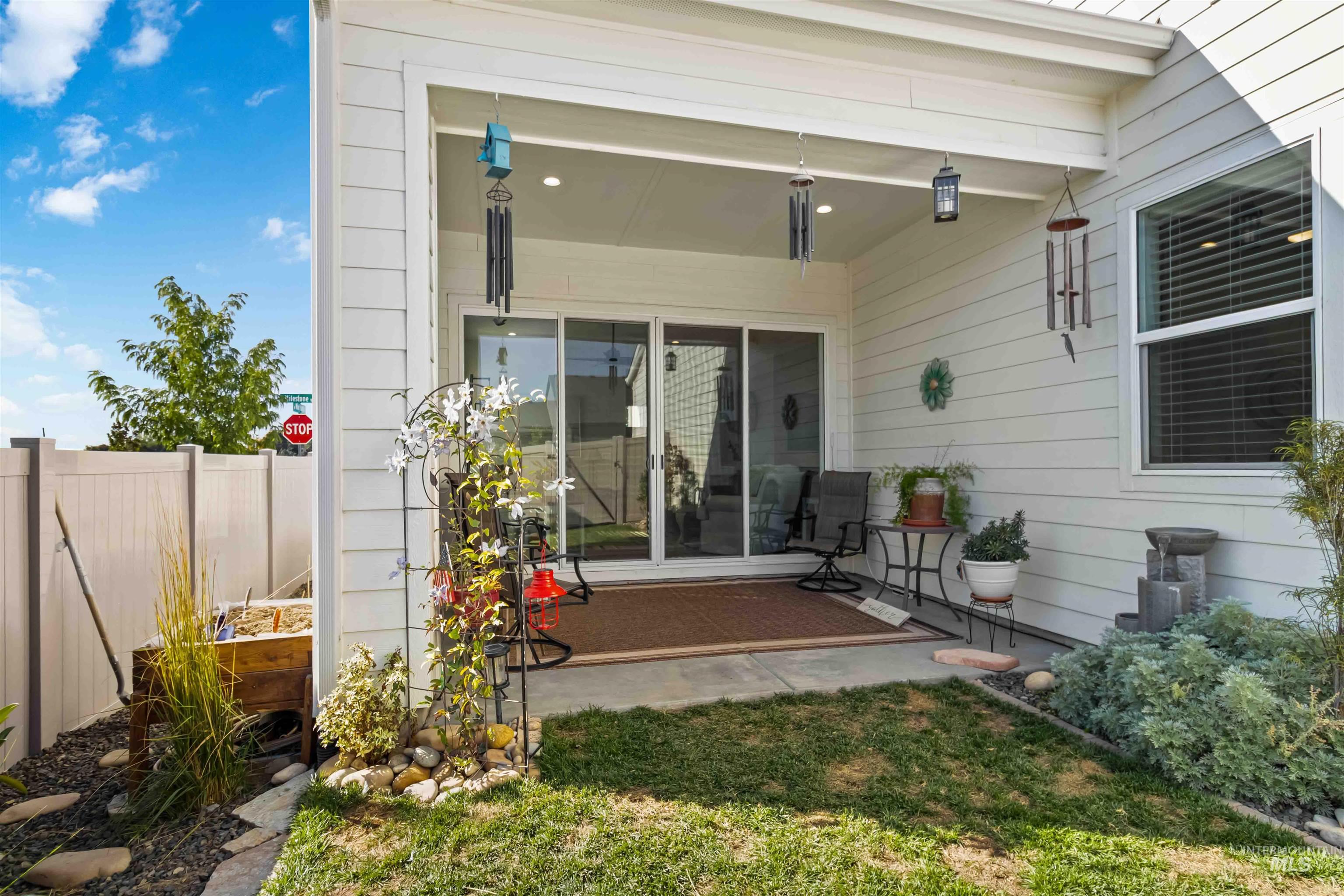 Quaint covered patio in back yard