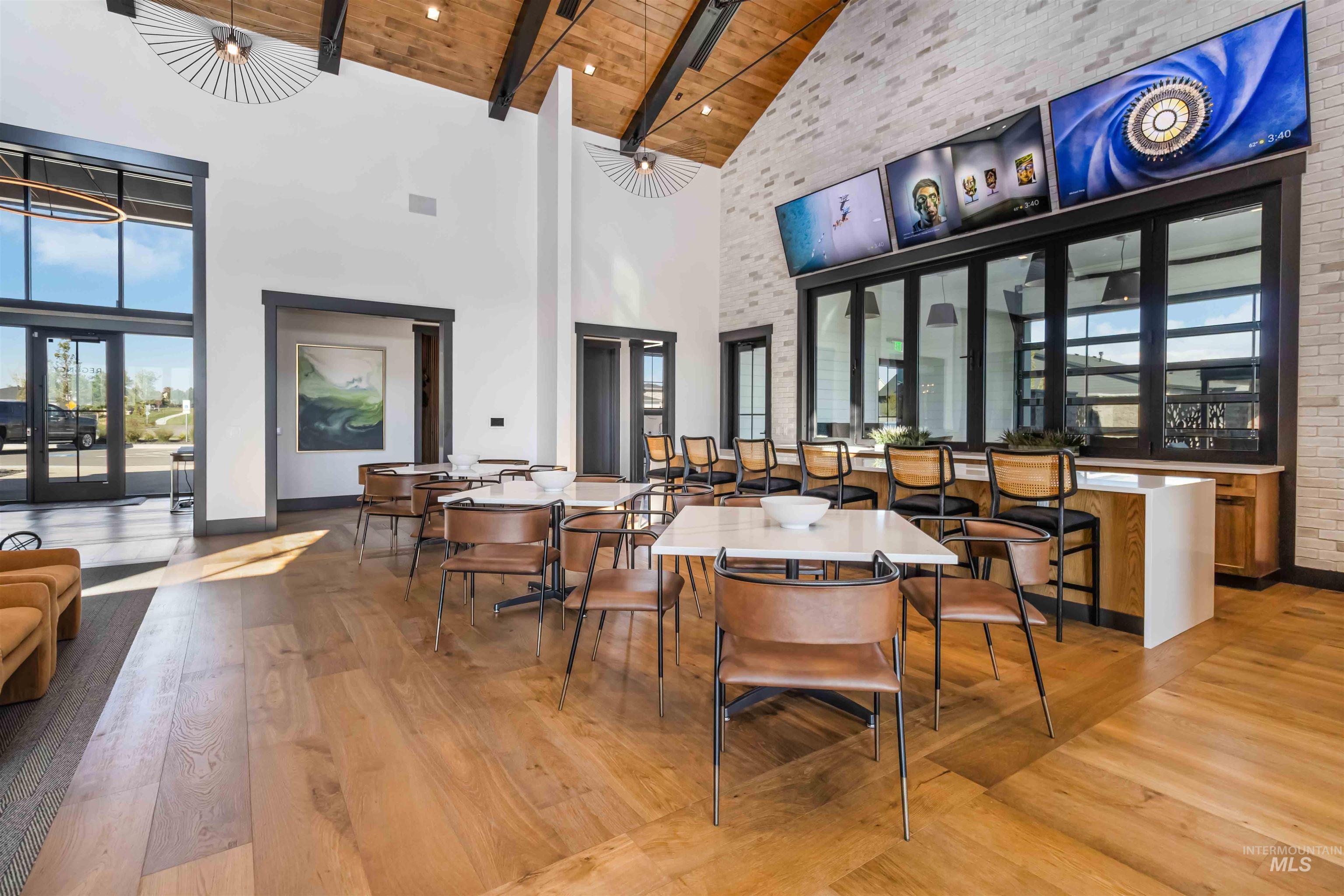 Common area featuring impressive & incredible design;  wood ceiling with exposed beams and high vaulted ceiling. Sure to WOW your guests.