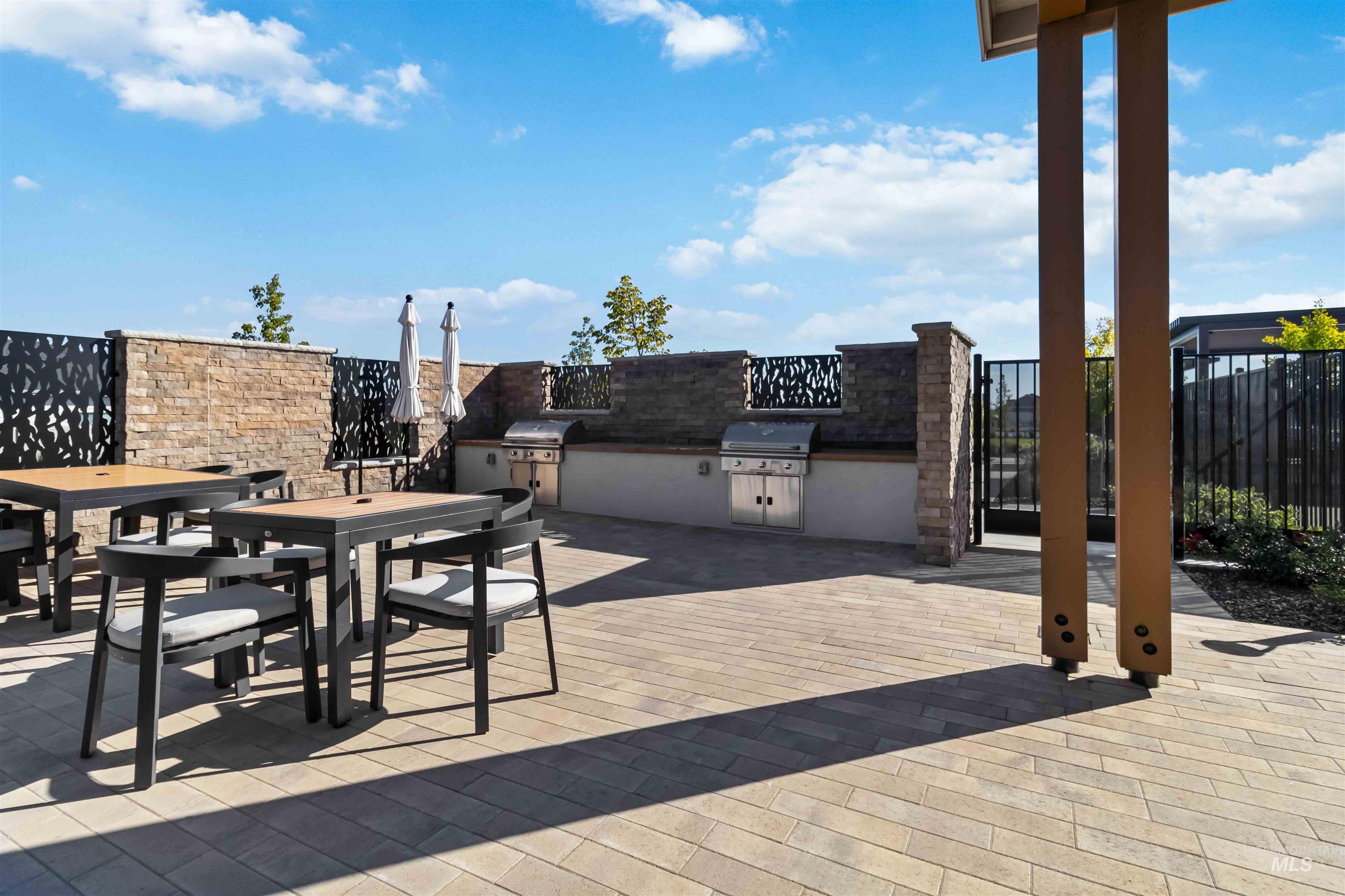Club House terrace featuring gathering area for grilling and outdoor dining