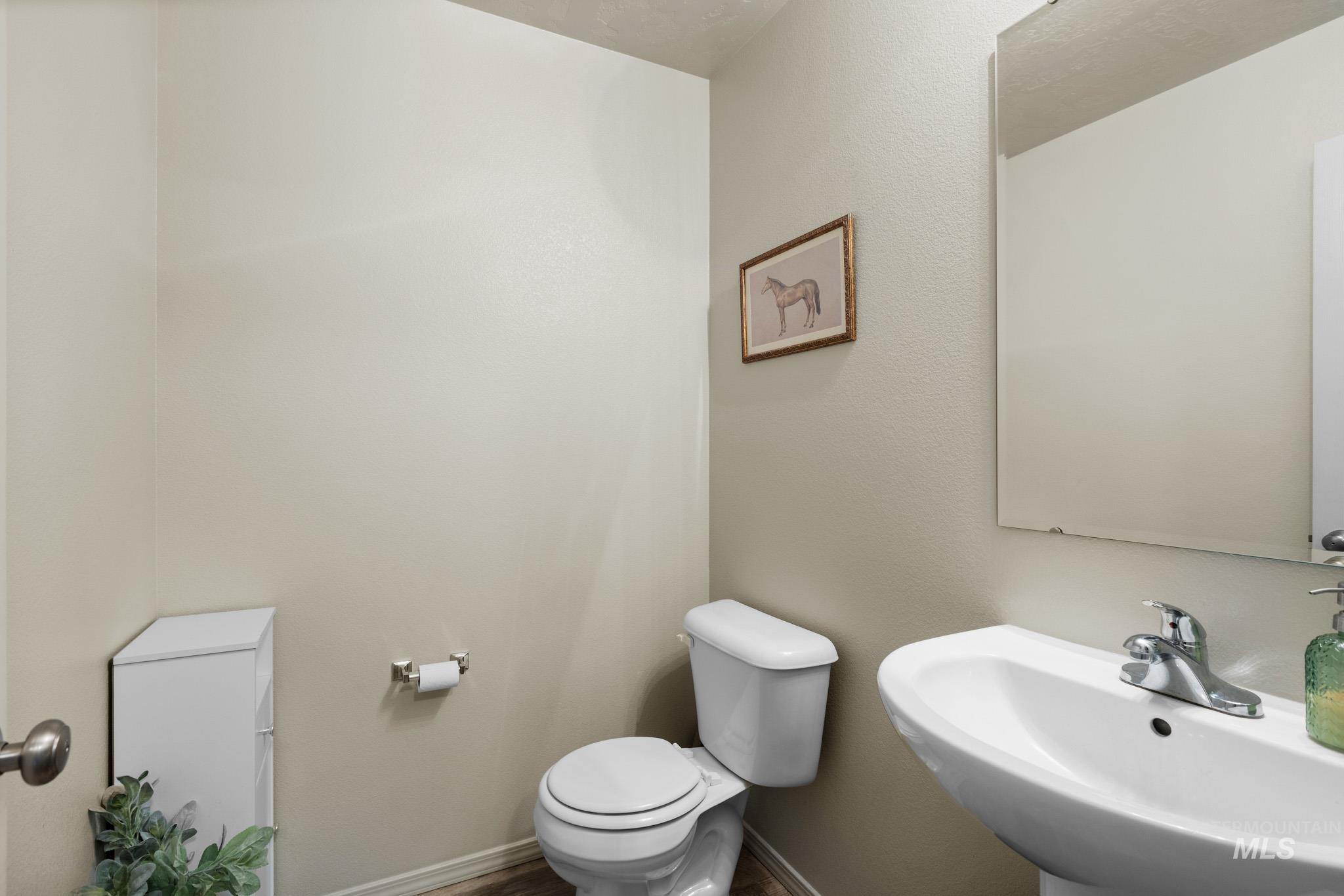 Bathroom with toilet and a sink