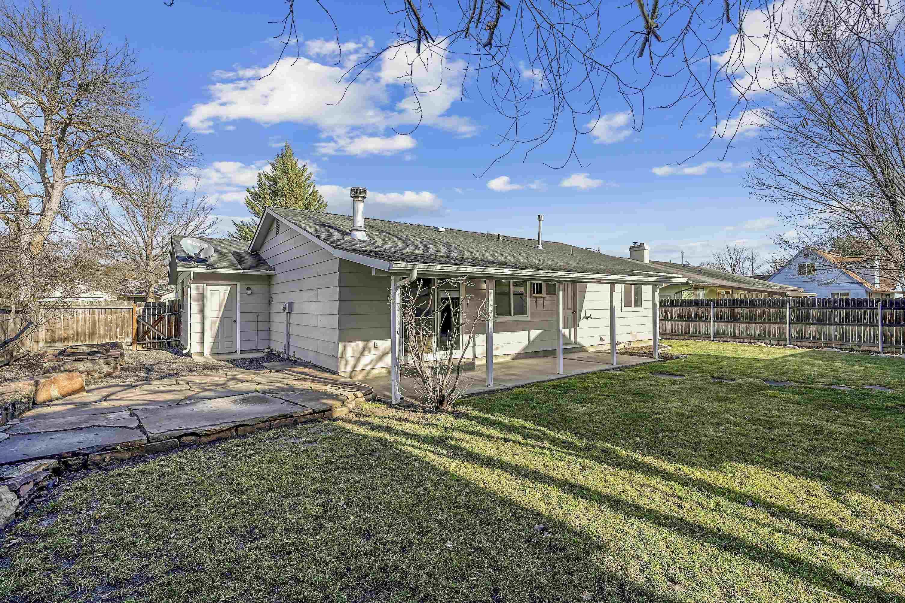 Back of house featuring a patio and a fenced backyard