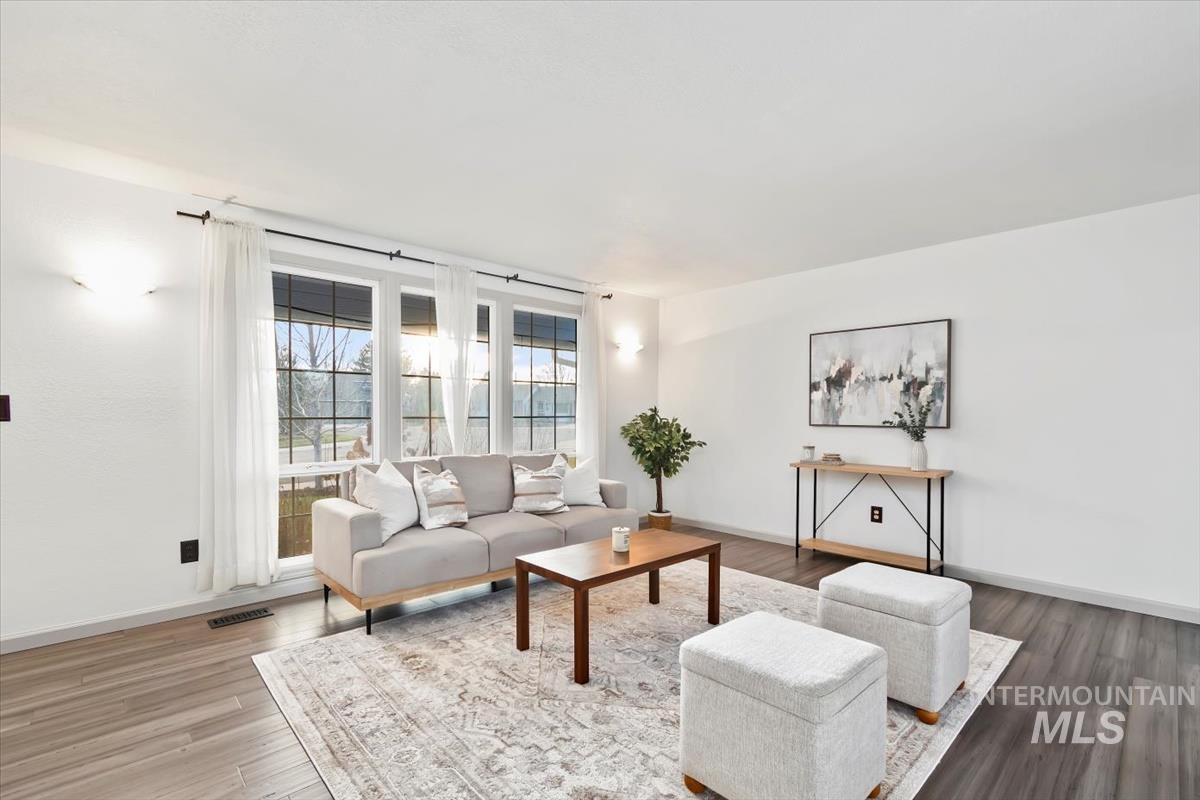 Living area with wood finished floors