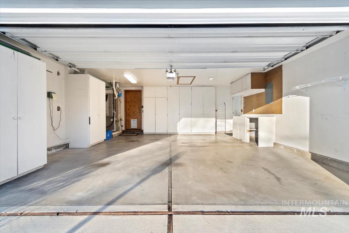 Garage featuring electric panel