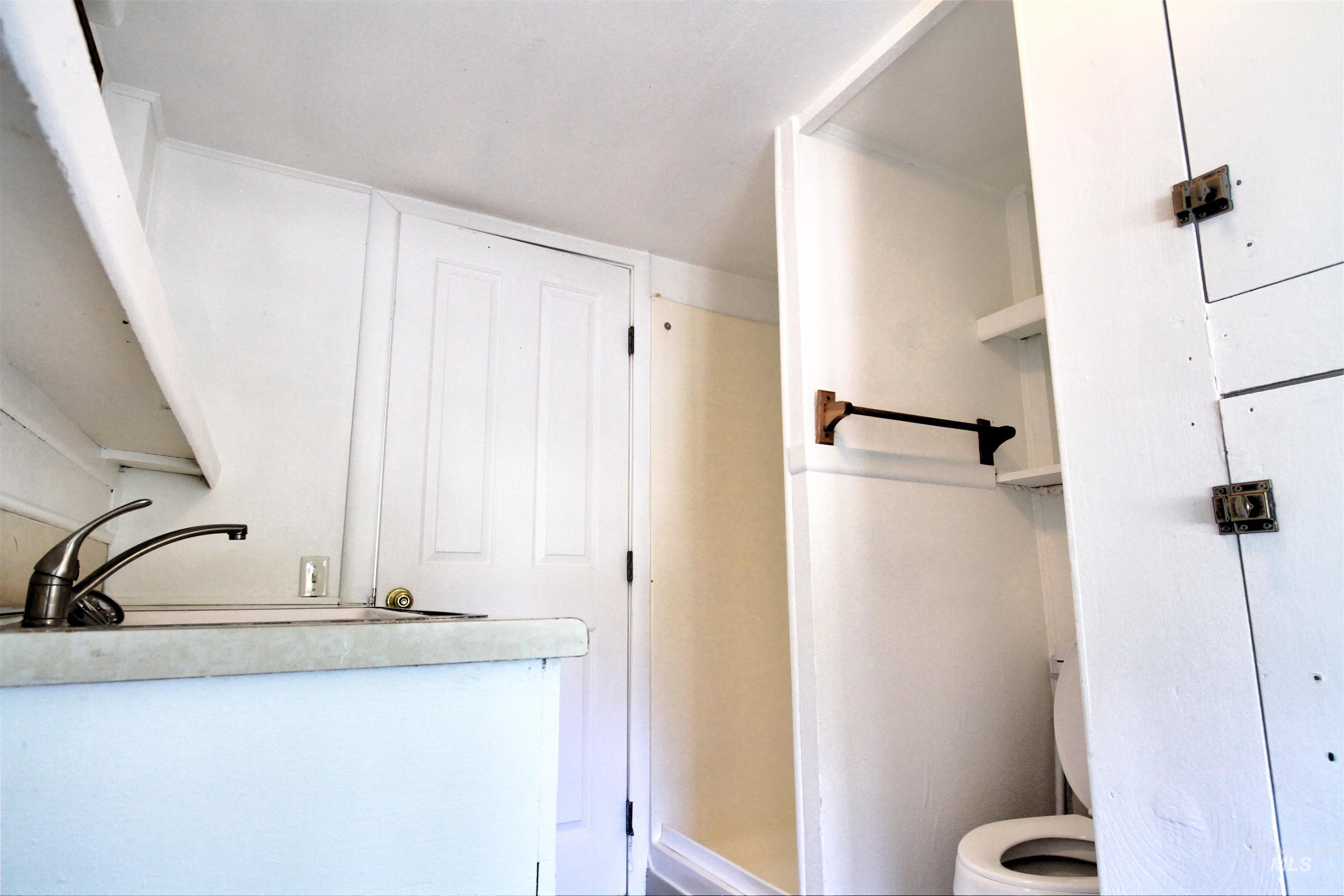 Full bath with a sink and toilet