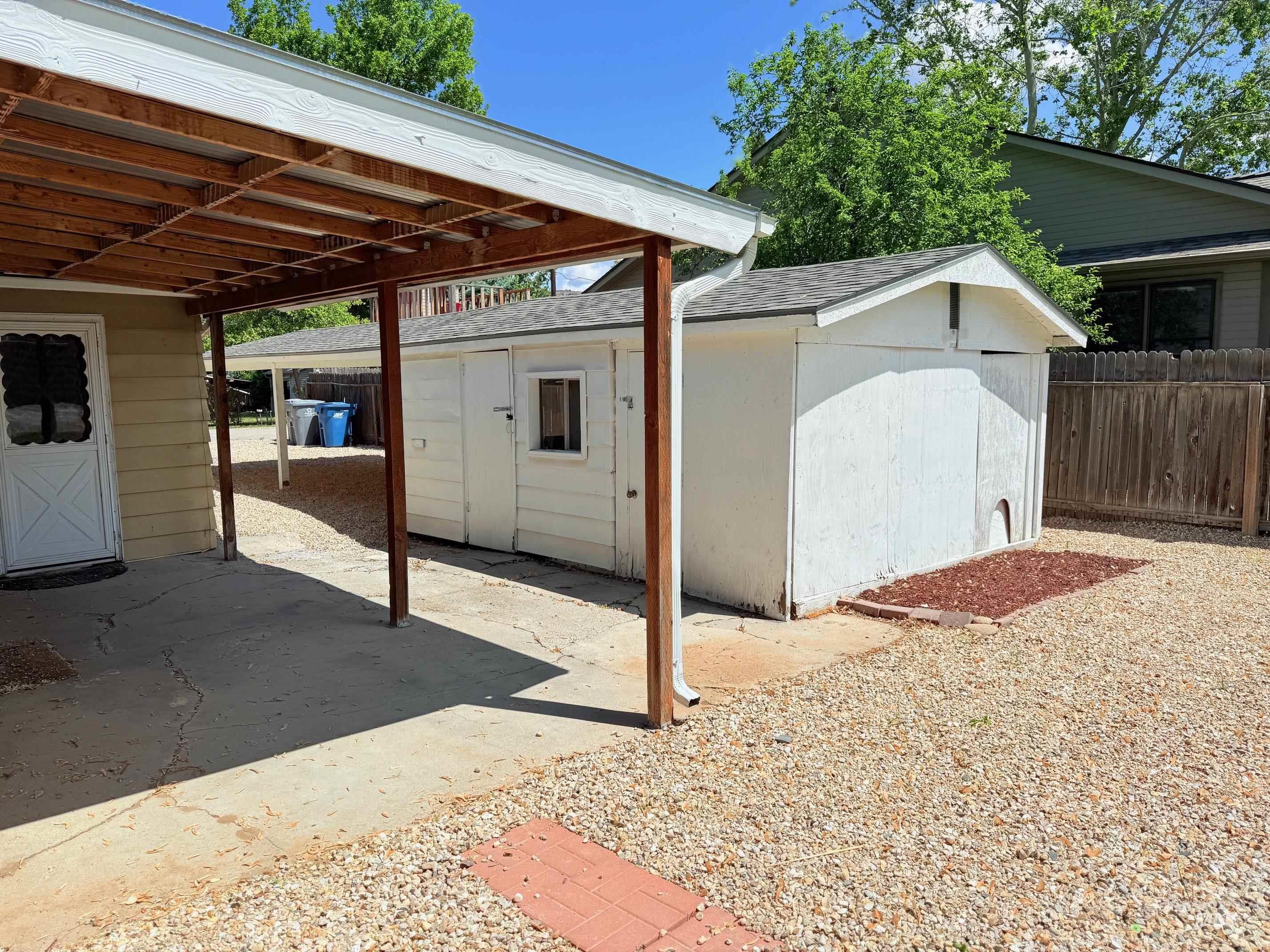 View of patio / terrace with an outbuilding