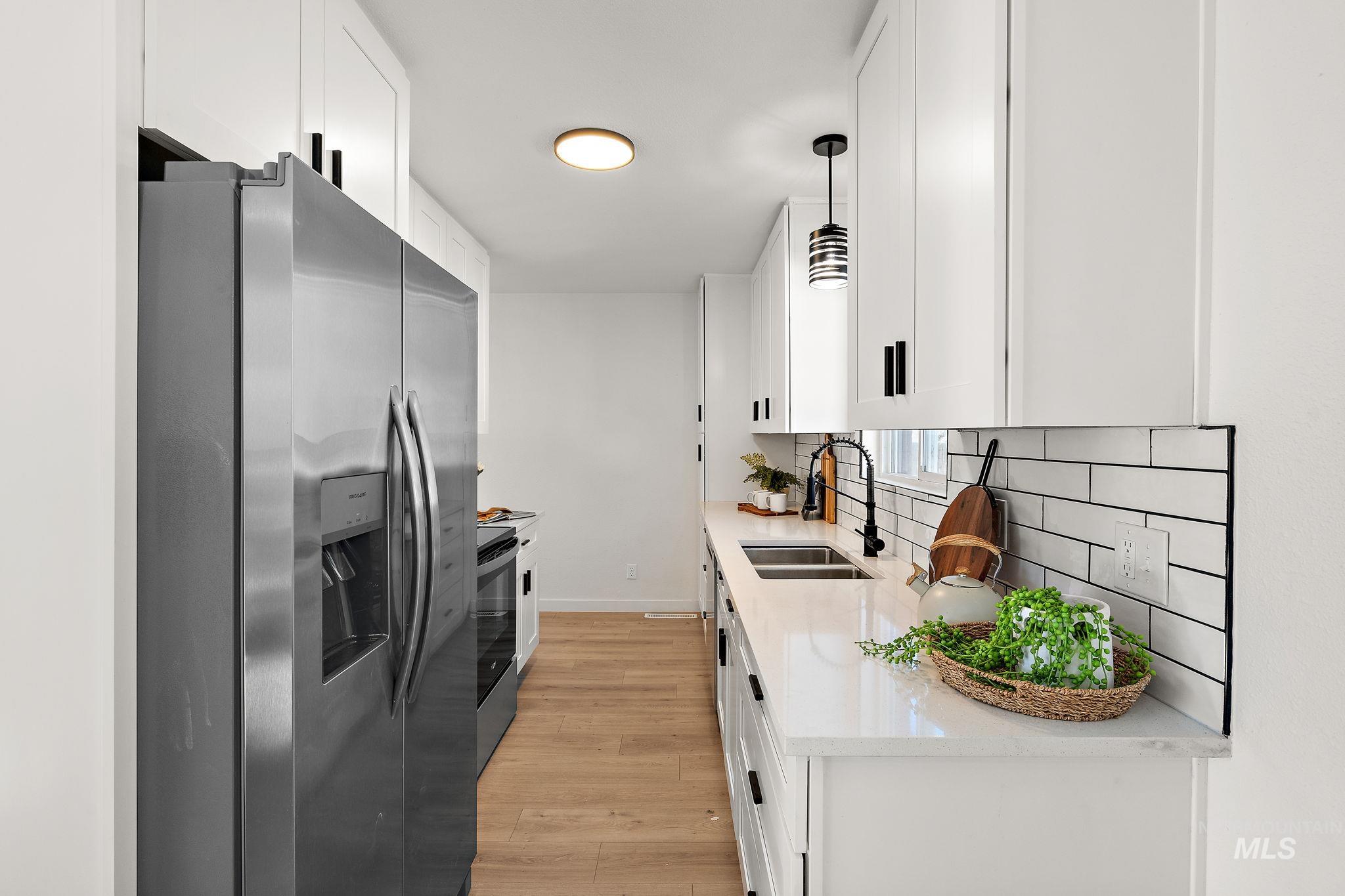 5338 W Spaulding St., Boise, Idaho 83705, 5 Bedrooms, 2 Bathrooms, Residential For Sale, Price $519,000,MLS 98972167