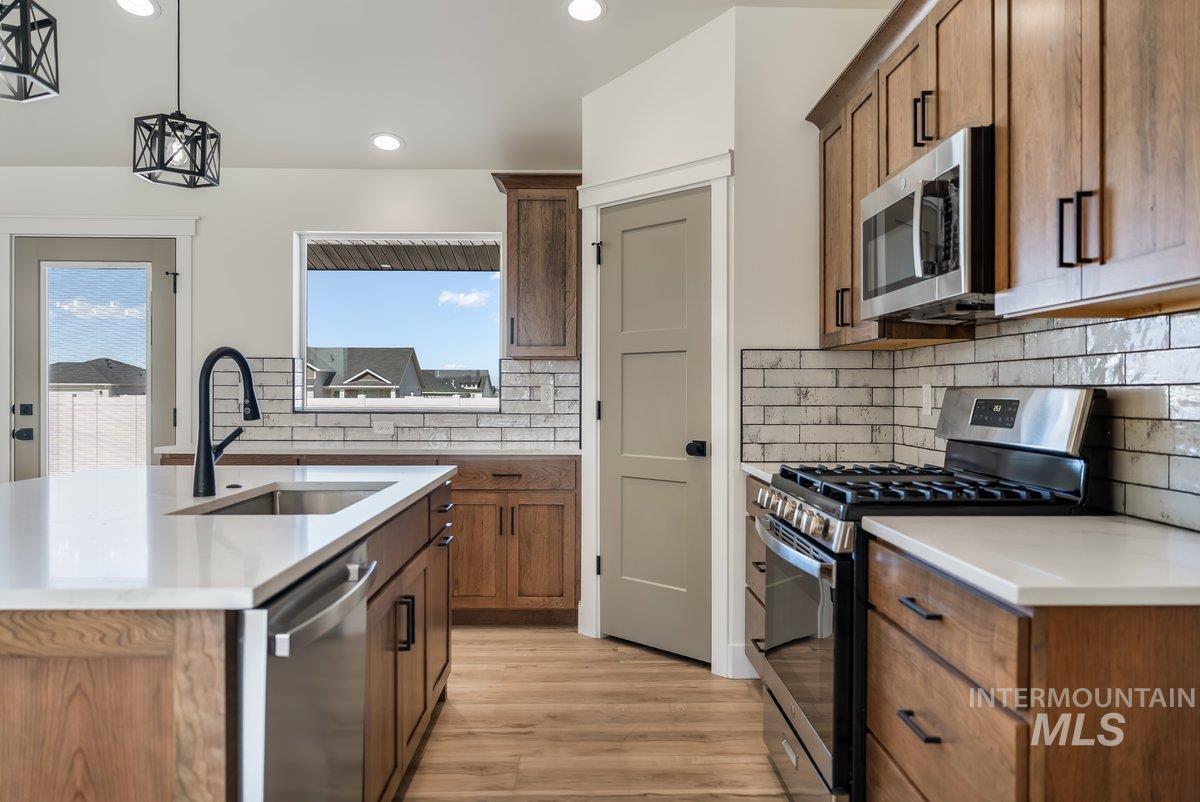 1210 Ira Burton, Twin Falls, Idaho 83301, 4 Bedrooms, 2 Bathrooms, Residential For Sale, Price $439,000,MLS 98972500