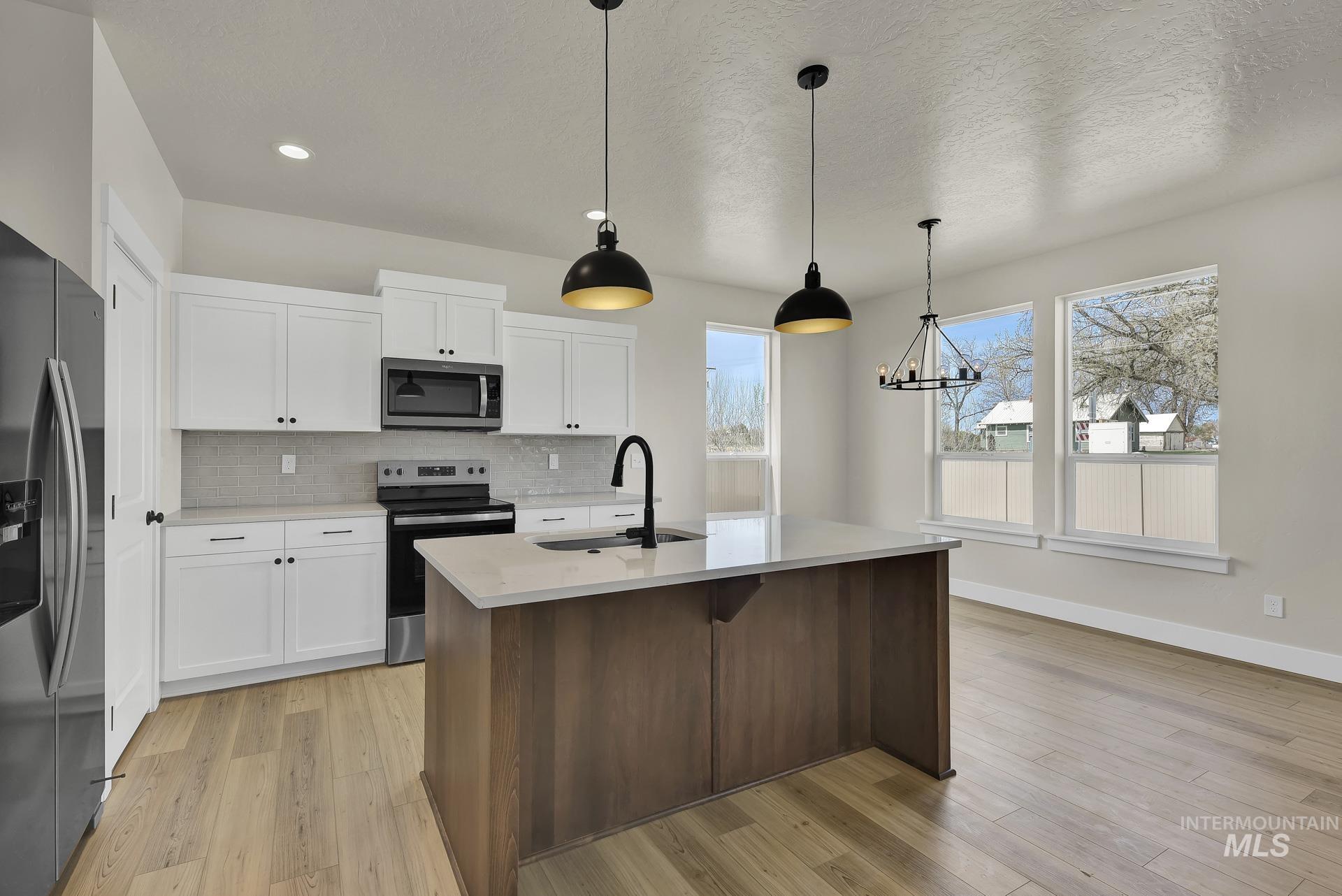 2910 Nieve Lane, Caldwell, Idaho 83605, 3 Bedrooms, 2.5 Bathrooms, Residential For Sale, Price $345,000,MLS 98972904