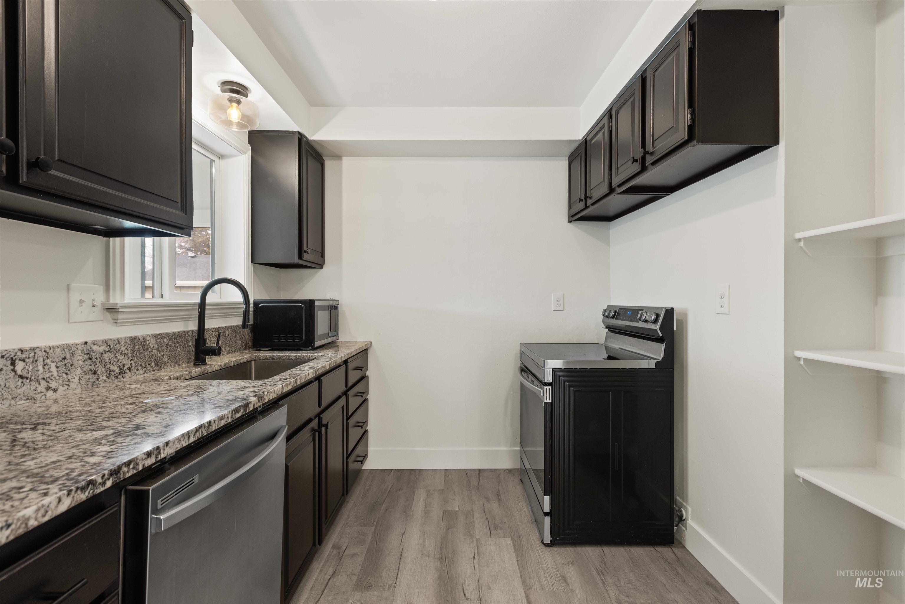 495 S 3rd East, Mountain Home, Idaho 83647, 3 Bedrooms, 1.5 Bathrooms, Residential Income For Sale, Price $575,000,MLS 98973172