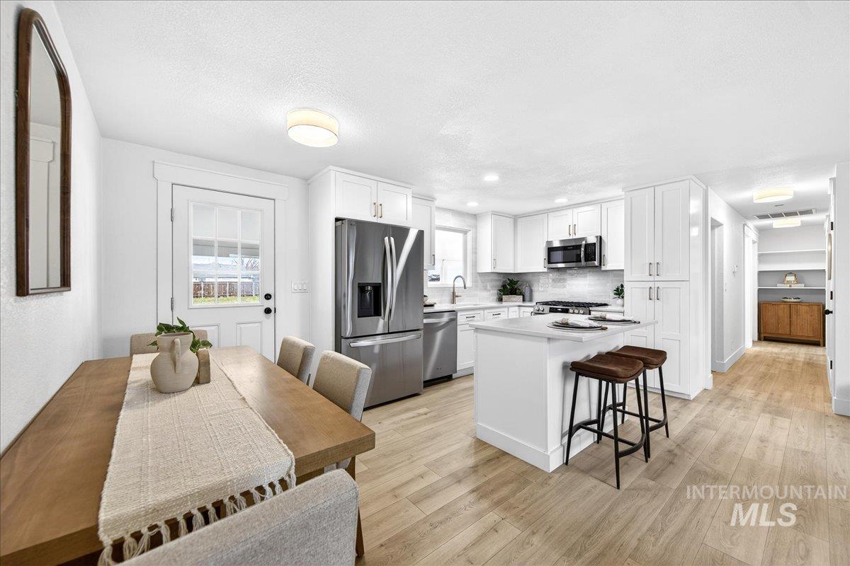 1118 N Dawn Dr., Boise, Idaho 83713, 4 Bedrooms, 2 Bathrooms, Residential For Sale, Price $679,900,MLS 98973415