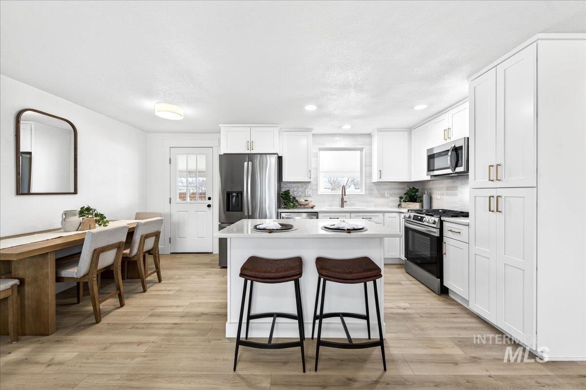 1118 N Dawn Dr., Boise, Idaho 83713, 4 Bedrooms, 2 Bathrooms, Residential For Sale, Price $679,900,MLS 98973415