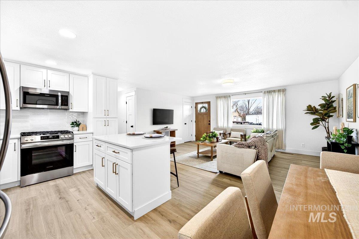 1118 N Dawn Dr., Boise, Idaho 83713, 4 Bedrooms, 2 Bathrooms, Residential For Sale, Price $679,900,MLS 98973415