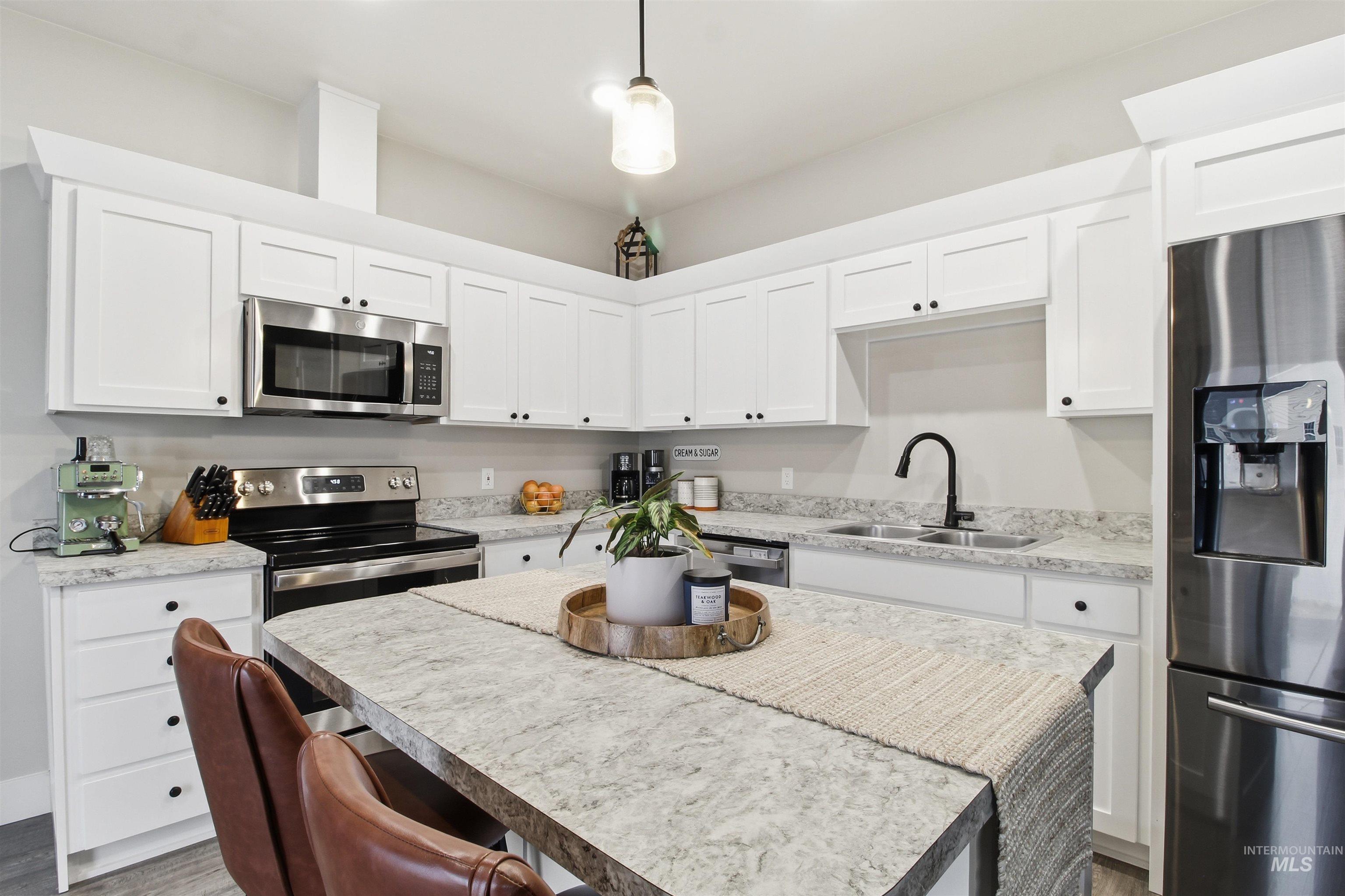 900 E 20th St., Burley, Idaho 88318, 3 Bedrooms, 2.5 Bathrooms, Residential For Sale, Price $309,000,MLS 98973485