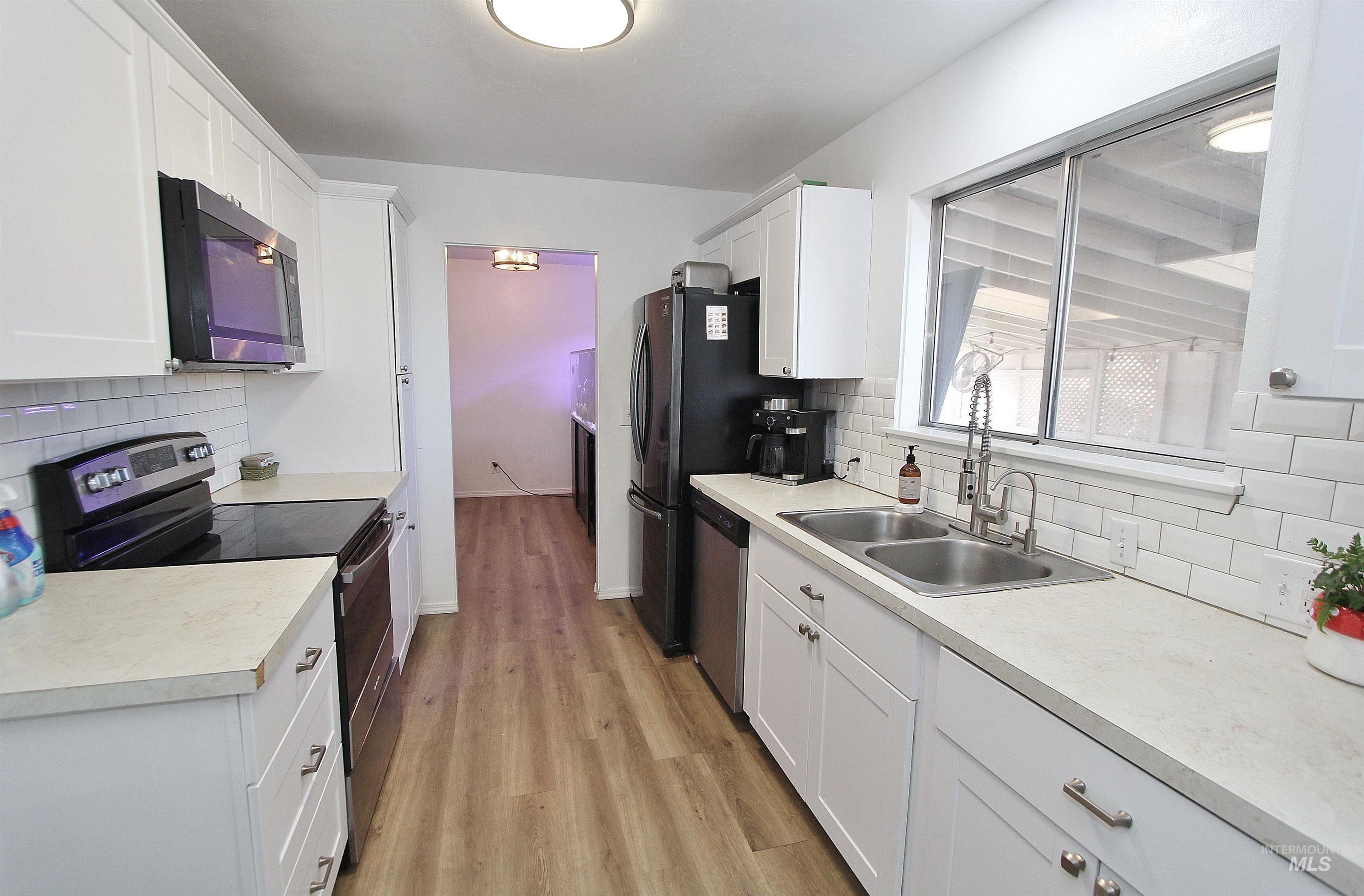 1185 N 6th East St, Mountain Home, Idaho 83647, 4 Bedrooms, 1.5 Bathrooms, Residential For Sale, Price $303,000,MLS 98973995