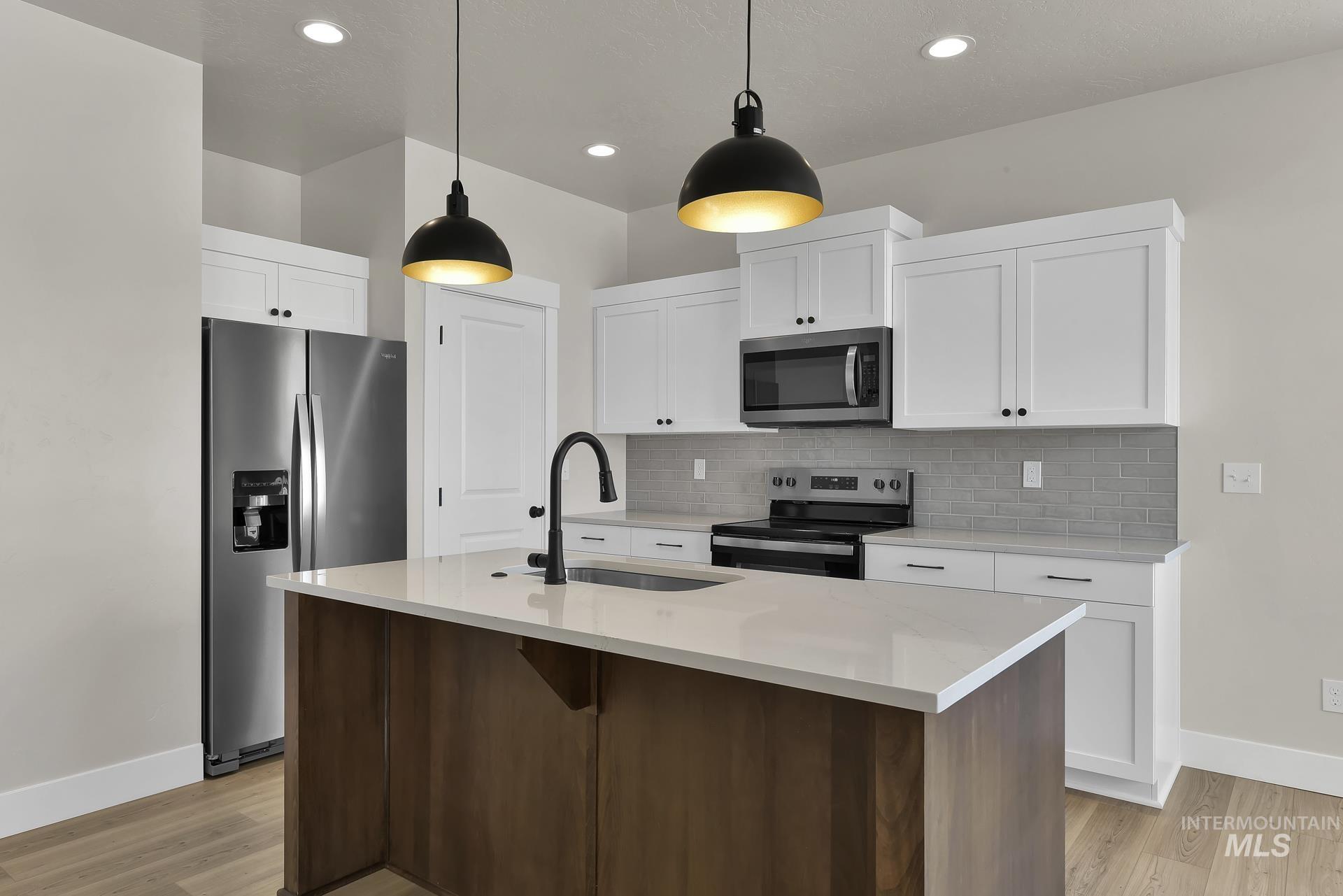 2910 Nieve Lane, Caldwell, Idaho 83605, 3 Bedrooms, 2.5 Bathrooms, Residential For Sale, Price $345,000,MLS 98975482