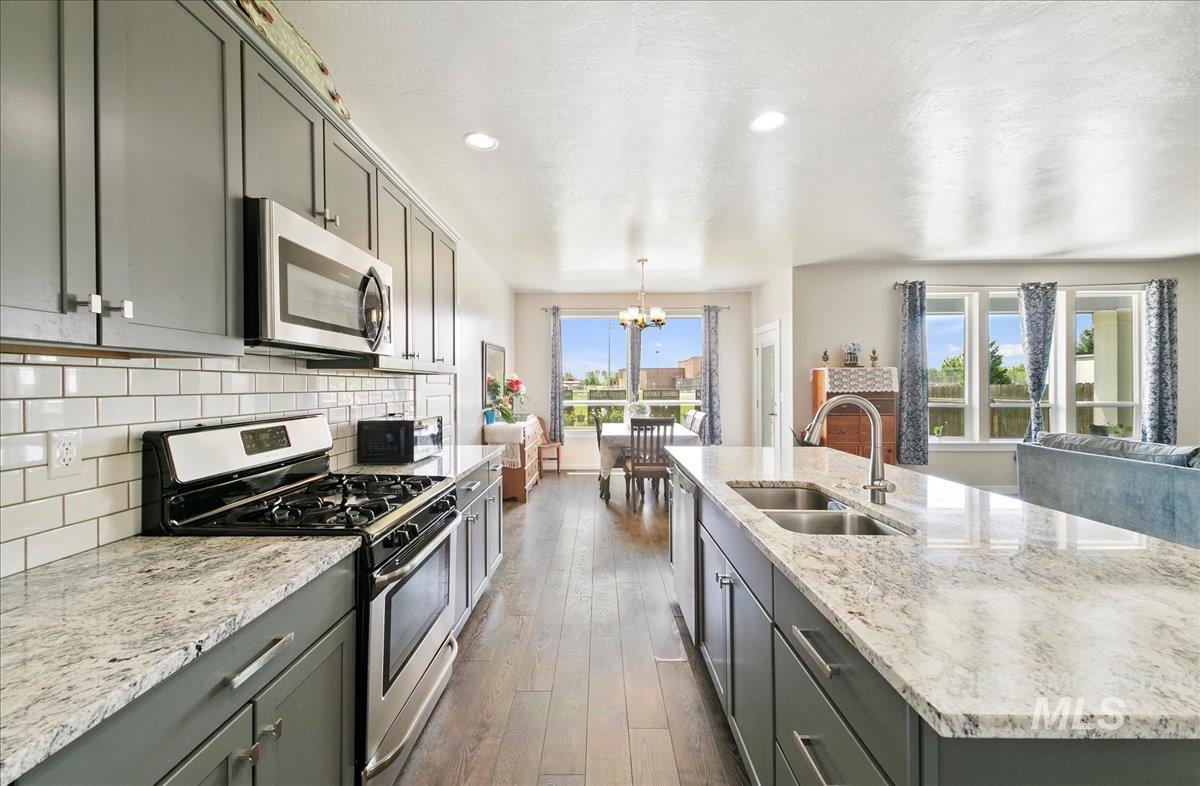 221 E Ensenada Drive, Meridian, Idaho 83642, 4 Bedrooms, 2.5 Bathrooms, Residential For Sale, Price $617,000,MLS 98975577