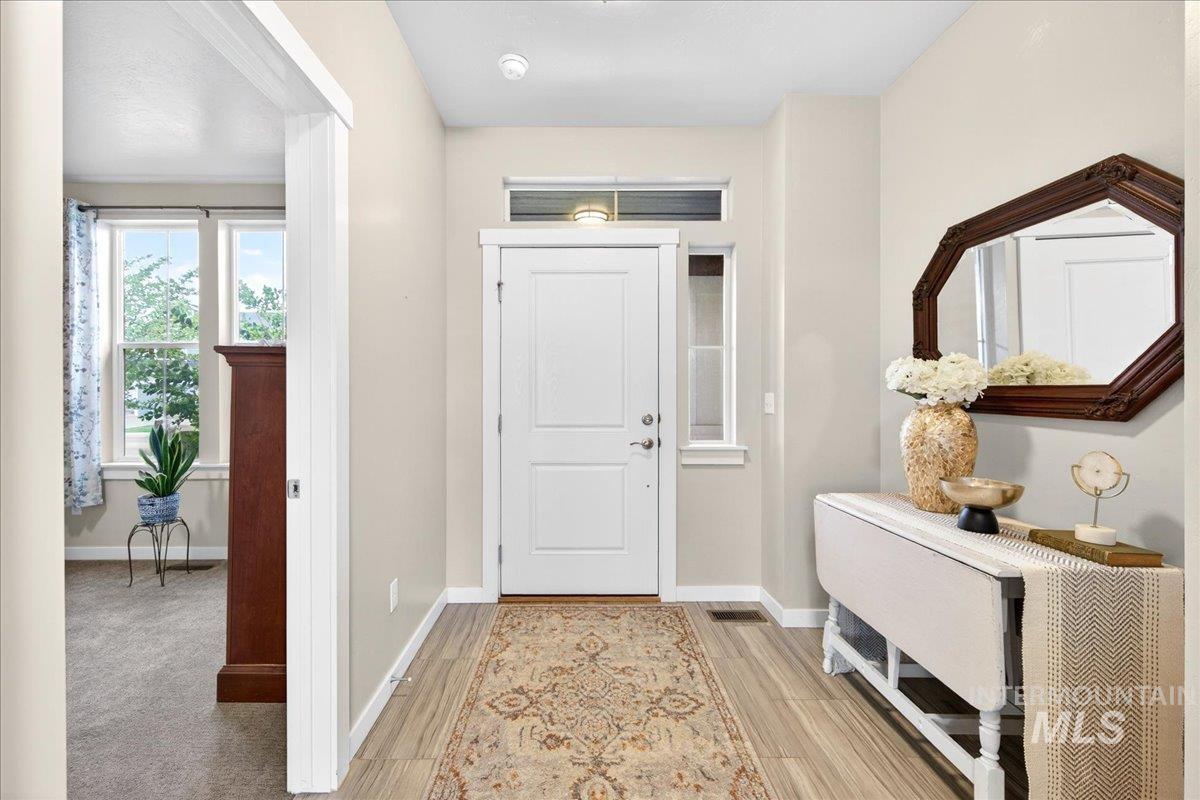 221 E Ensenada Drive, Meridian, Idaho 83646, 4 Bedrooms, 2.5 Bathrooms, Residential For Sale, Price $617,000,MLS 98975577