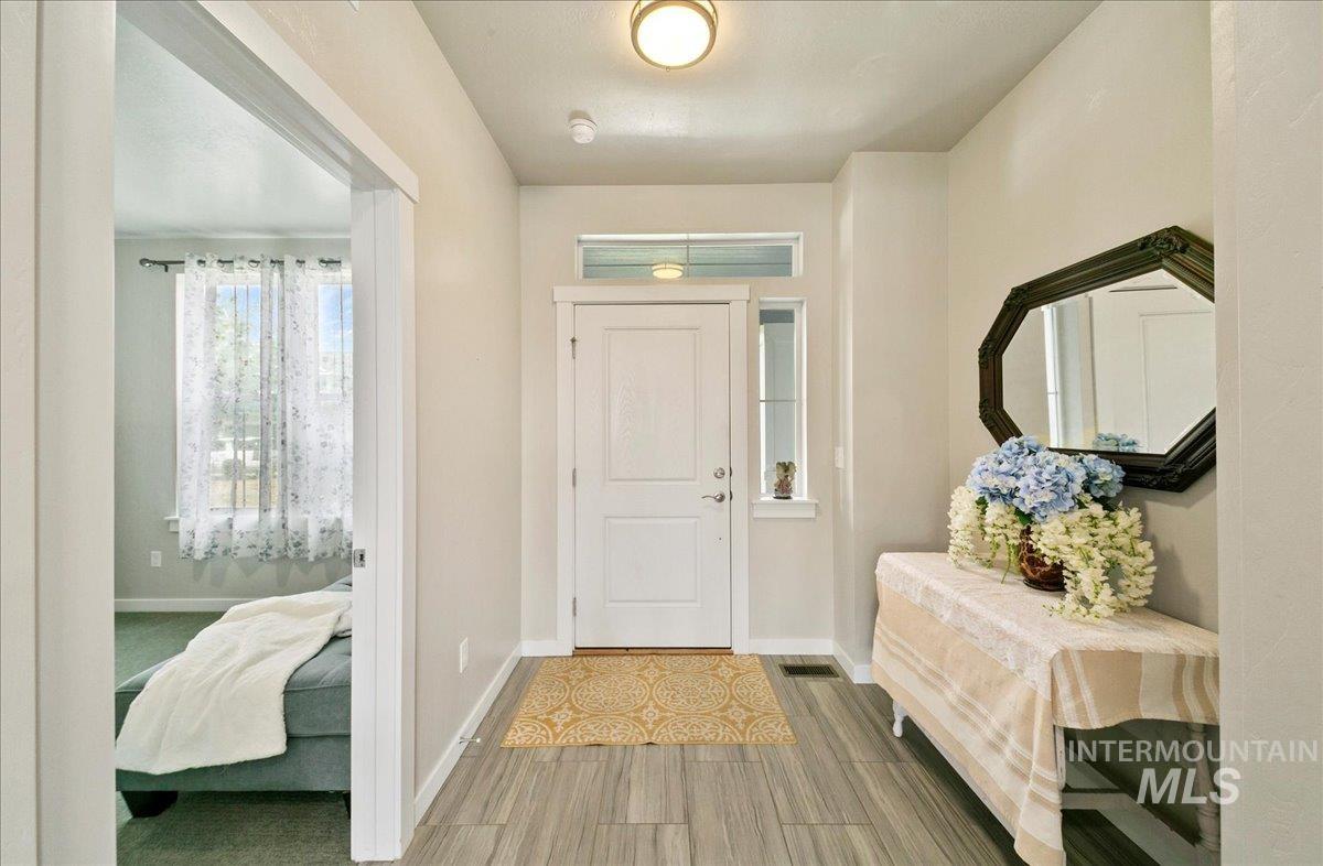 221 E Ensenada Drive, Meridian, Idaho 83642, 4 Bedrooms, 2.5 Bathrooms, Residential For Sale, Price $617,000,MLS 98975577