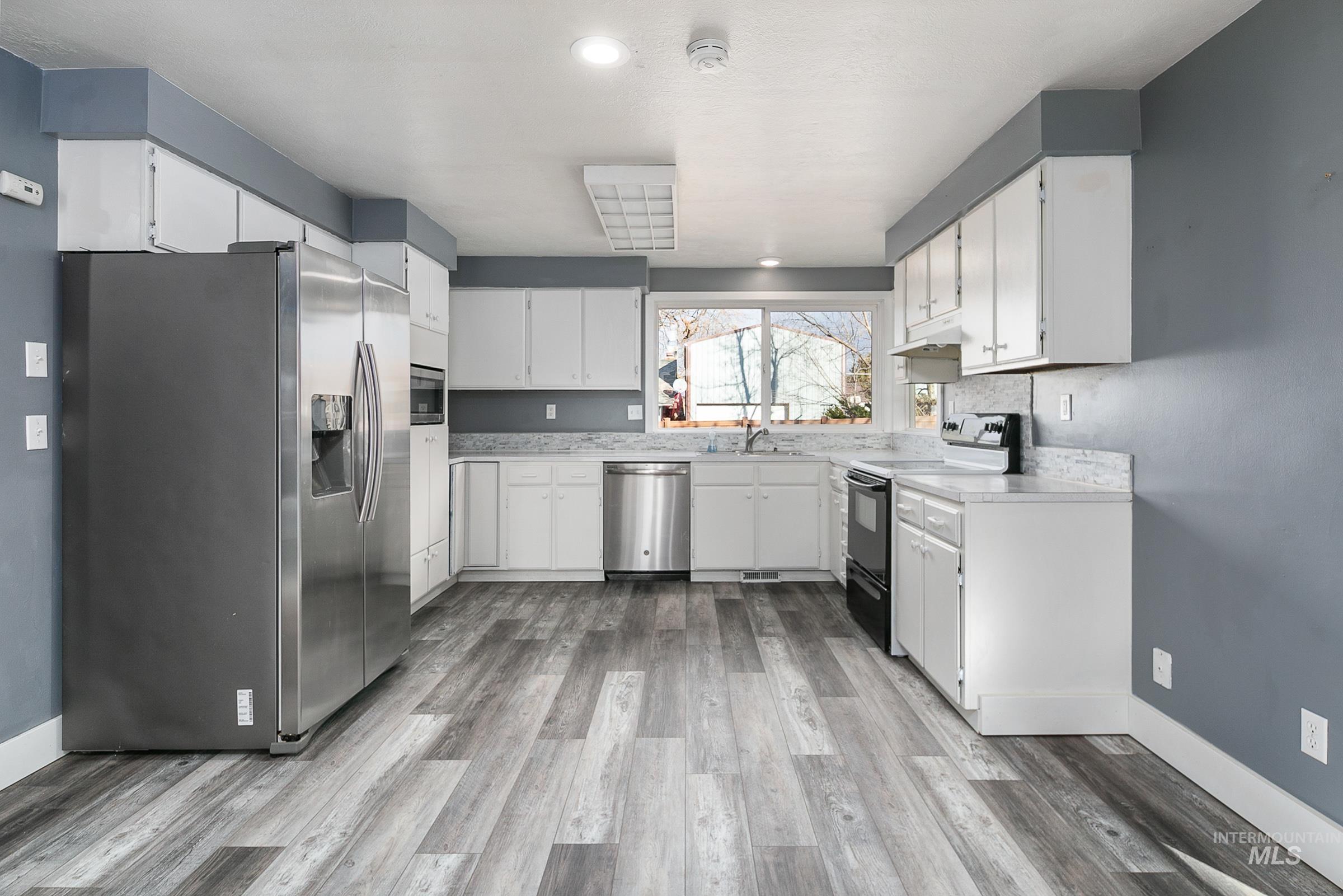 2163 N Workland, Boise, Idaho 83704, 4 Bedrooms, 2 Bathrooms, Residential For Sale, Price $424,990,MLS 98975691