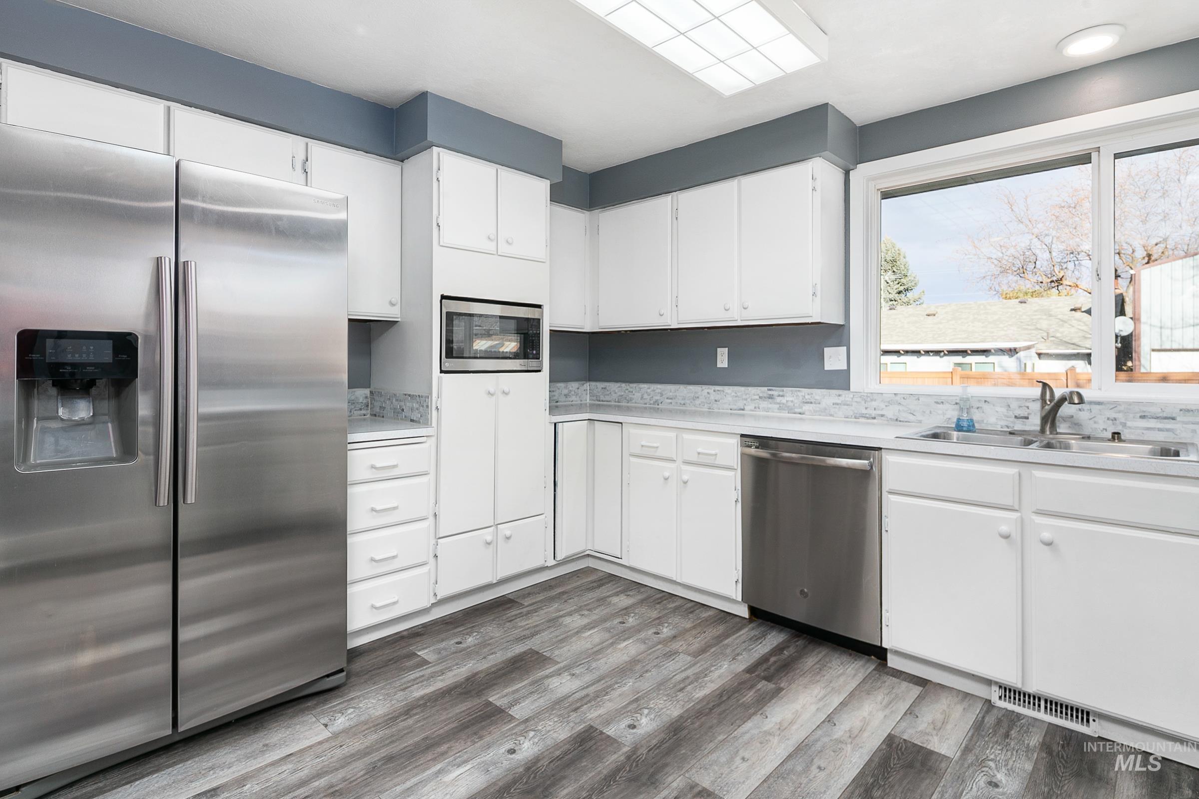 2163 N Workland, Boise, Idaho 83704, 4 Bedrooms, 2 Bathrooms, Residential For Sale, Price $424,990,MLS 98975691