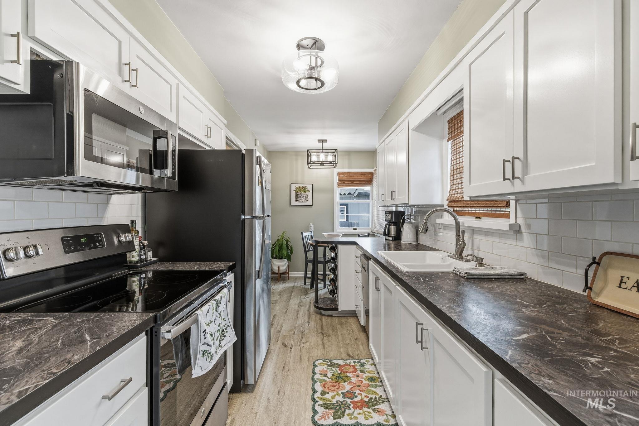 1426 S Gourley St., Boise, Idaho 83705, 3 Bedrooms, 2 Bathrooms, Residential For Sale, Price $469,900, 98976206