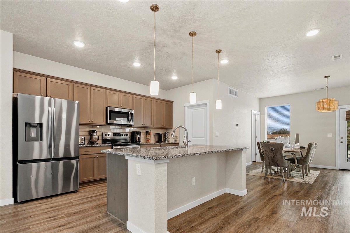 3125 N Network Ln, Boise, Idaho 83704, 4 Bedrooms, 3.5 Bathrooms, Residential For Sale, Price $459,900,MLS 98977118