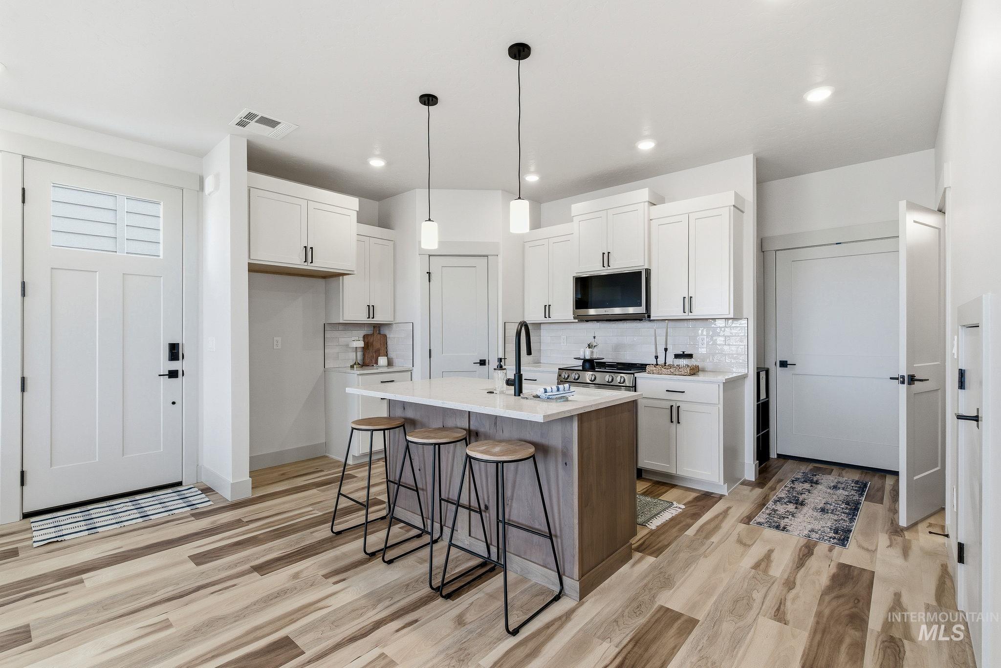 1950 NW Strahorn Dr., Mountain Home, Idaho 83647, 3 Bedrooms, 2.5 Bathrooms, Residential For Sale, Price $339,900,MLS 98977380