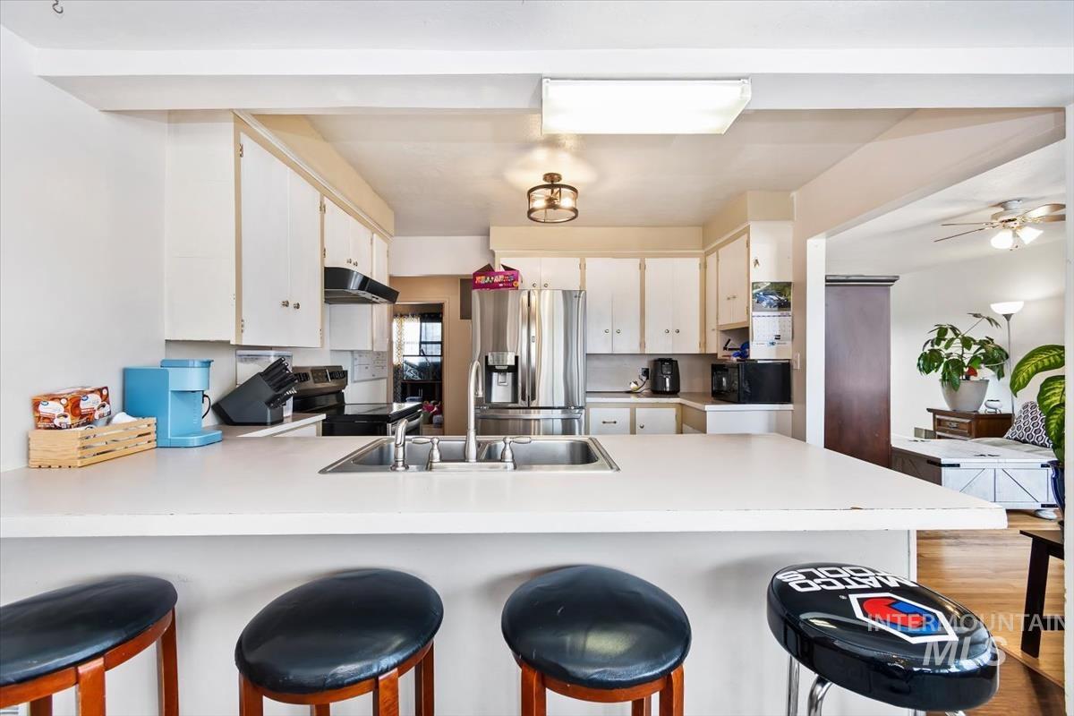 520 N 11th E., Mountain Home, Idaho 83647, 4 Bedrooms, 2 Bathrooms, Residential For Sale, Price $320,000,MLS 98978110