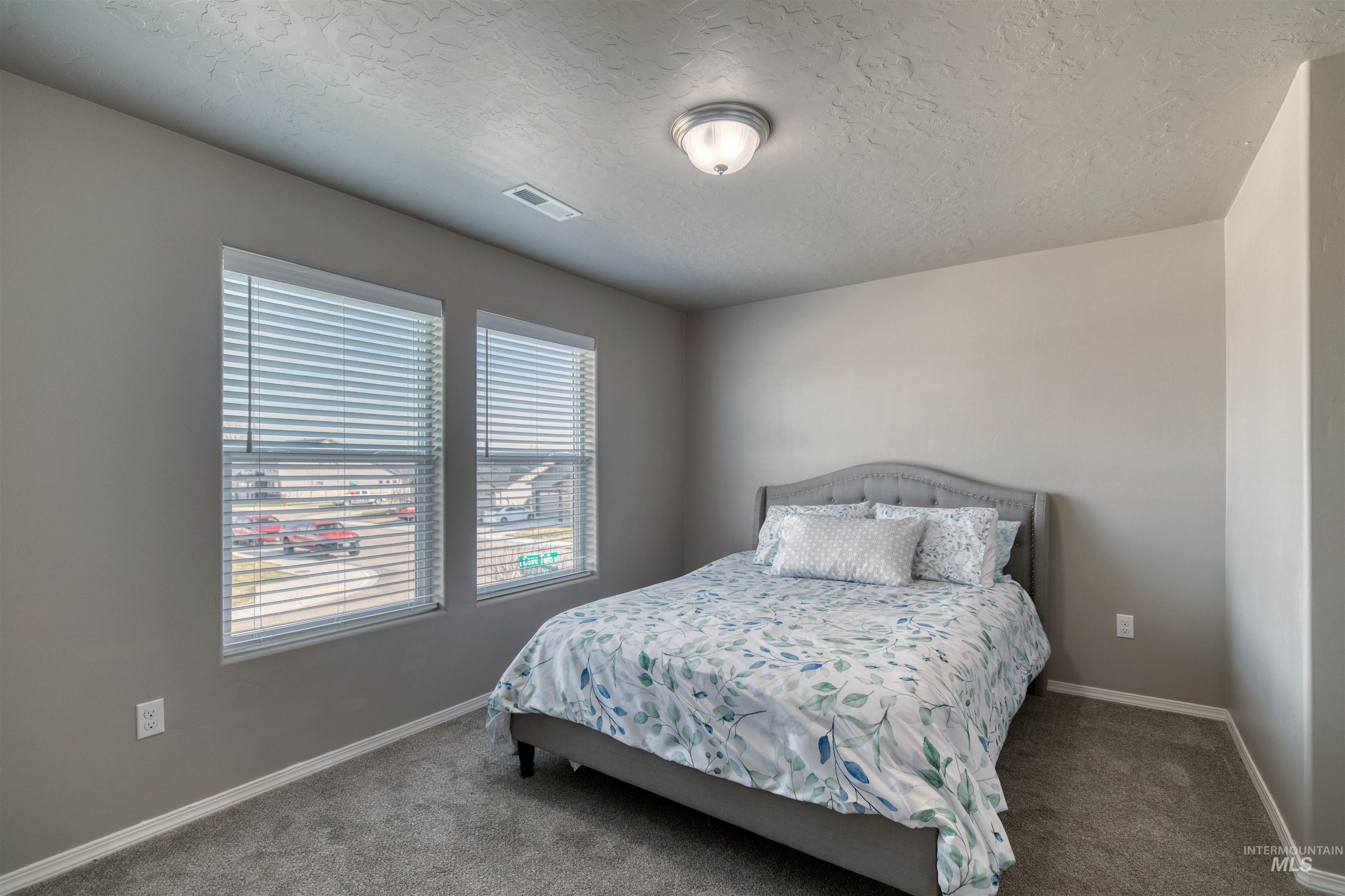 1913 E Cave Falls St., Kuna, Idaho 83634, 3 Bedrooms, 2.5 Bathrooms, Residential For Sale, Price $424,900,MLS 98978701