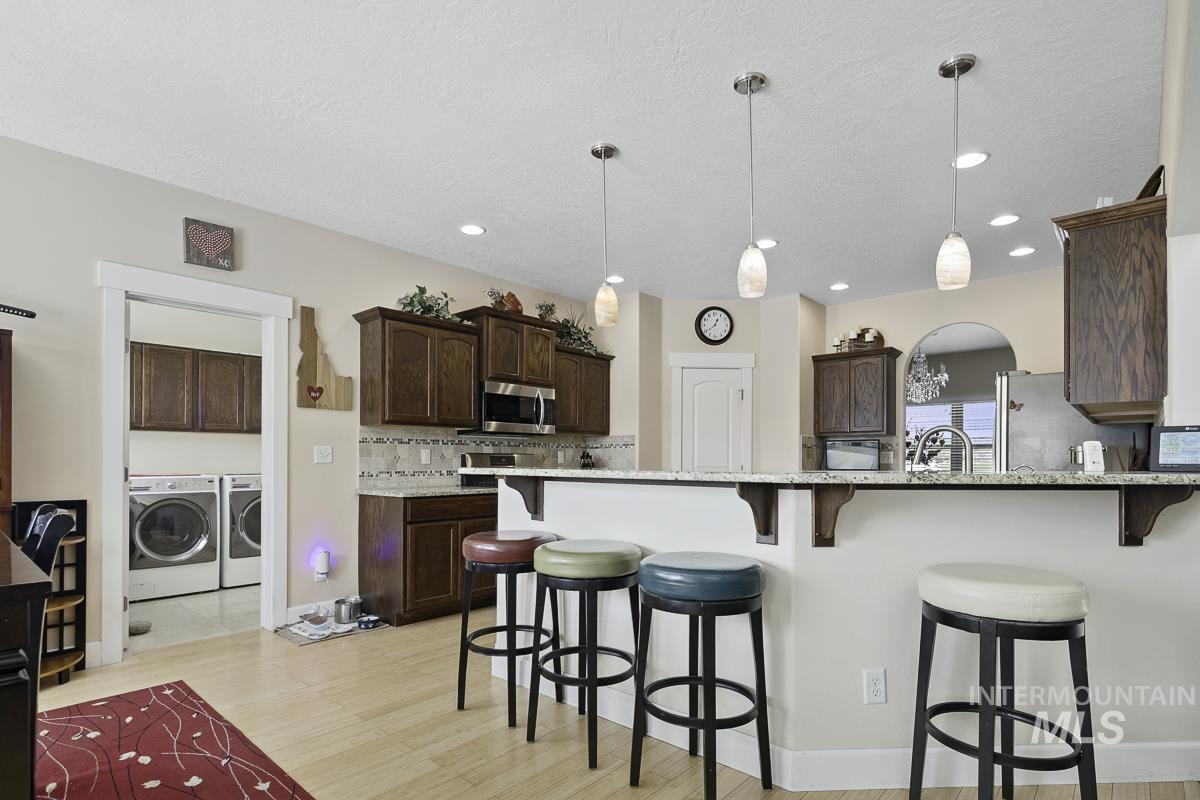 9013 W Cambridge Ct, Hammett, Idaho 83627, 4 Bedrooms, 3.5 Bathrooms, Residential For Sale, Price $794,900, 98978939