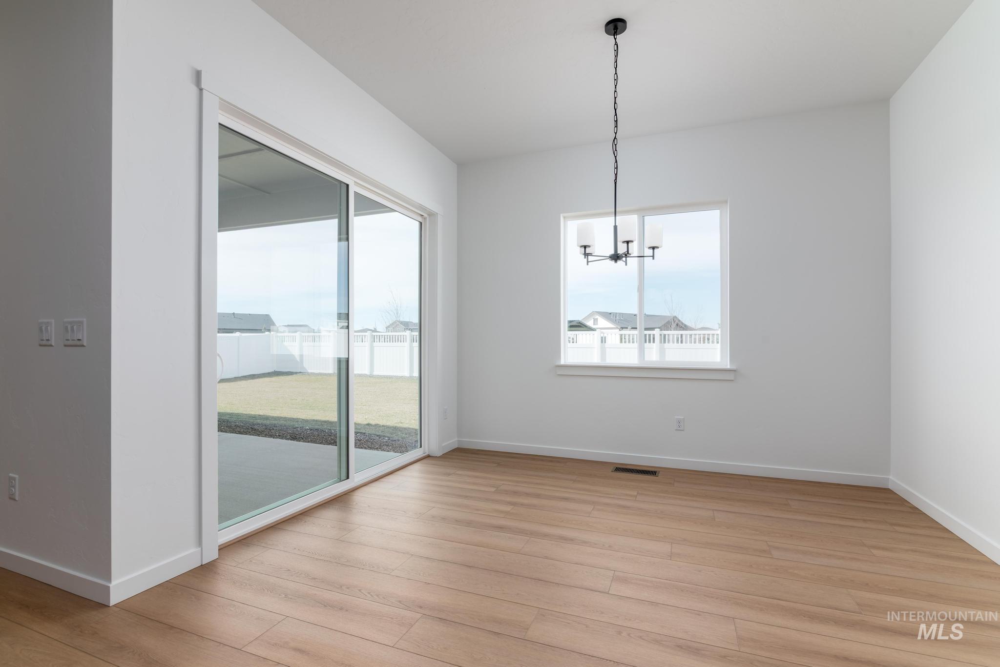 8459 S Country Wind Ave, Meridian, Idaho 83642, 3 Bedrooms, 2.5 Bathrooms, Residential For Sale, Price $659,000,MLS 98979872