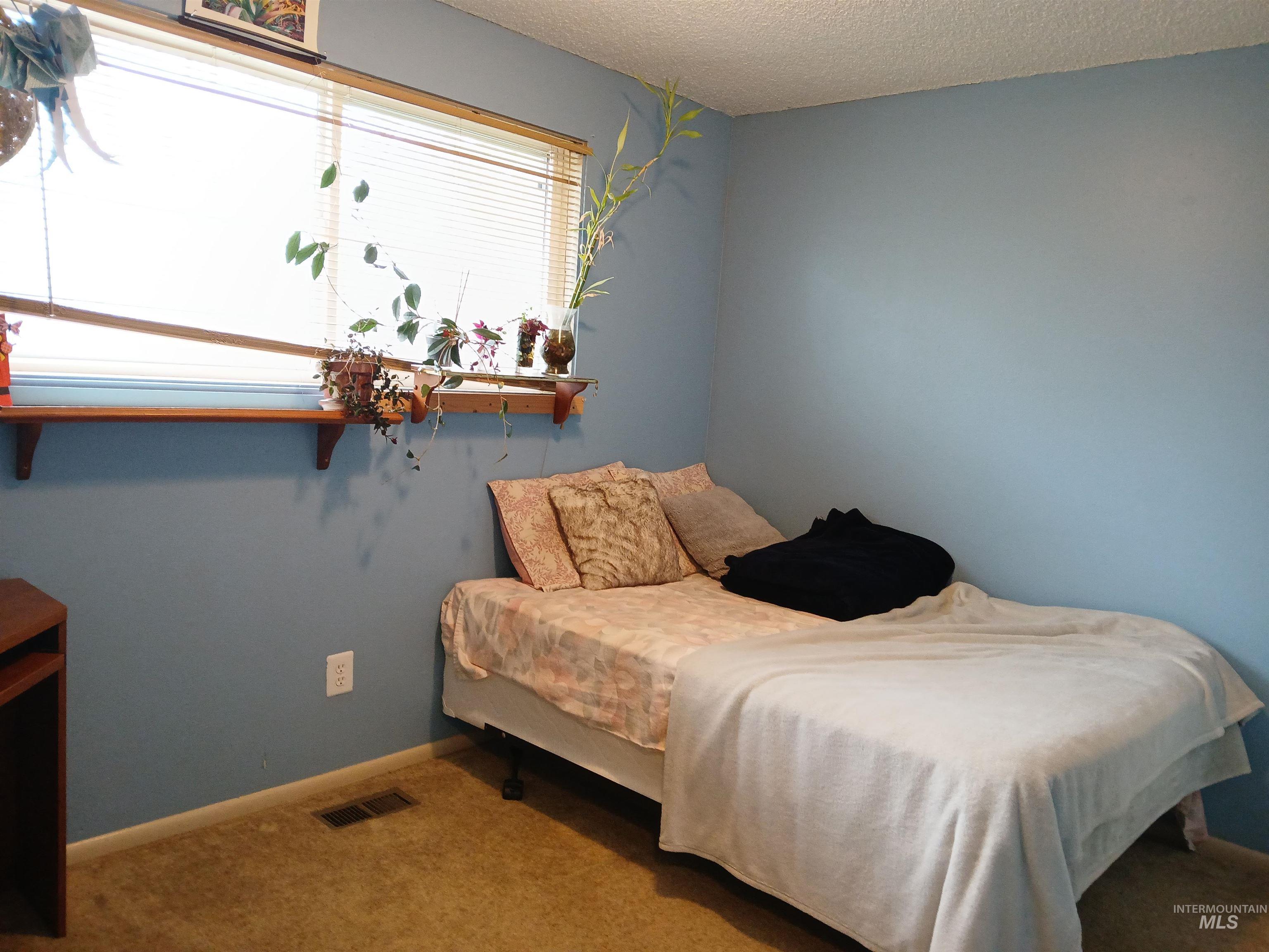 2224 S Rachel Circle, Boise, Idaho 83706-4608, 4 Bedrooms, 2 Bathrooms, Residential For Sale, Price $330,000,MLS 98980152