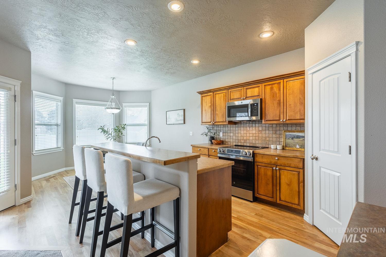 3406 S Ascaino, Meridian, Idaho 83642, 5 Bedrooms, 2.5 Bathrooms, Residential For Sale, Price $499,000,MLS 98980424