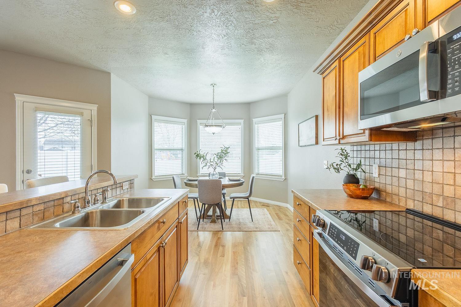 3406 S Ascaino, Meridian, Idaho 83642, 5 Bedrooms, 2.5 Bathrooms, Residential For Sale, Price $499,000,MLS 98980424