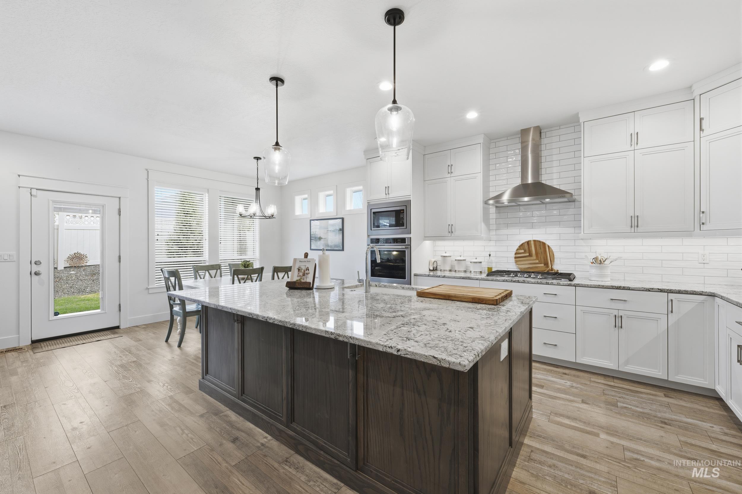 1310 W Winsett, Kuna, Idaho 83634-2460, 4 Bedrooms, 3 Bathrooms, Residential For Sale, Price $660,000,MLS 98980546