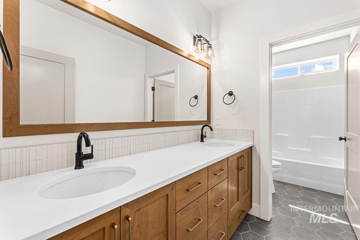 13374 N Spring Creek Way, Boise, Idaho 83714, 5 Bedrooms, 3.5 Bathrooms, Residential Income For Sale, Price $913,537, 98980923