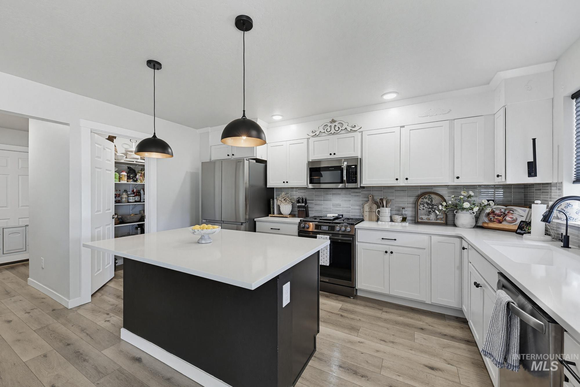 13588 S Woodwind Ave, Nampa, Idaho 83651, 5 Bedrooms, 2.5 Bathrooms, Residential For Sale, Price $525,000,MLS 98982405