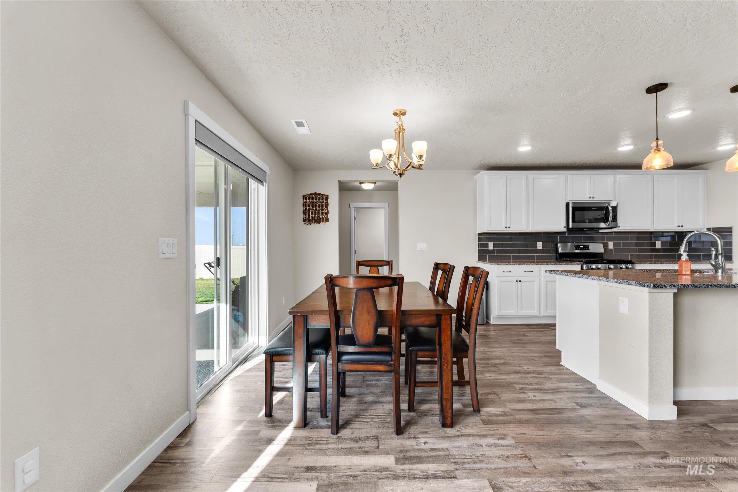 705 SW Raelynn St, Mountain Home, Idaho 83647, 4 Bedrooms, 2.5 Bathrooms, Residential For Sale, Price $465,000,MLS 98982988