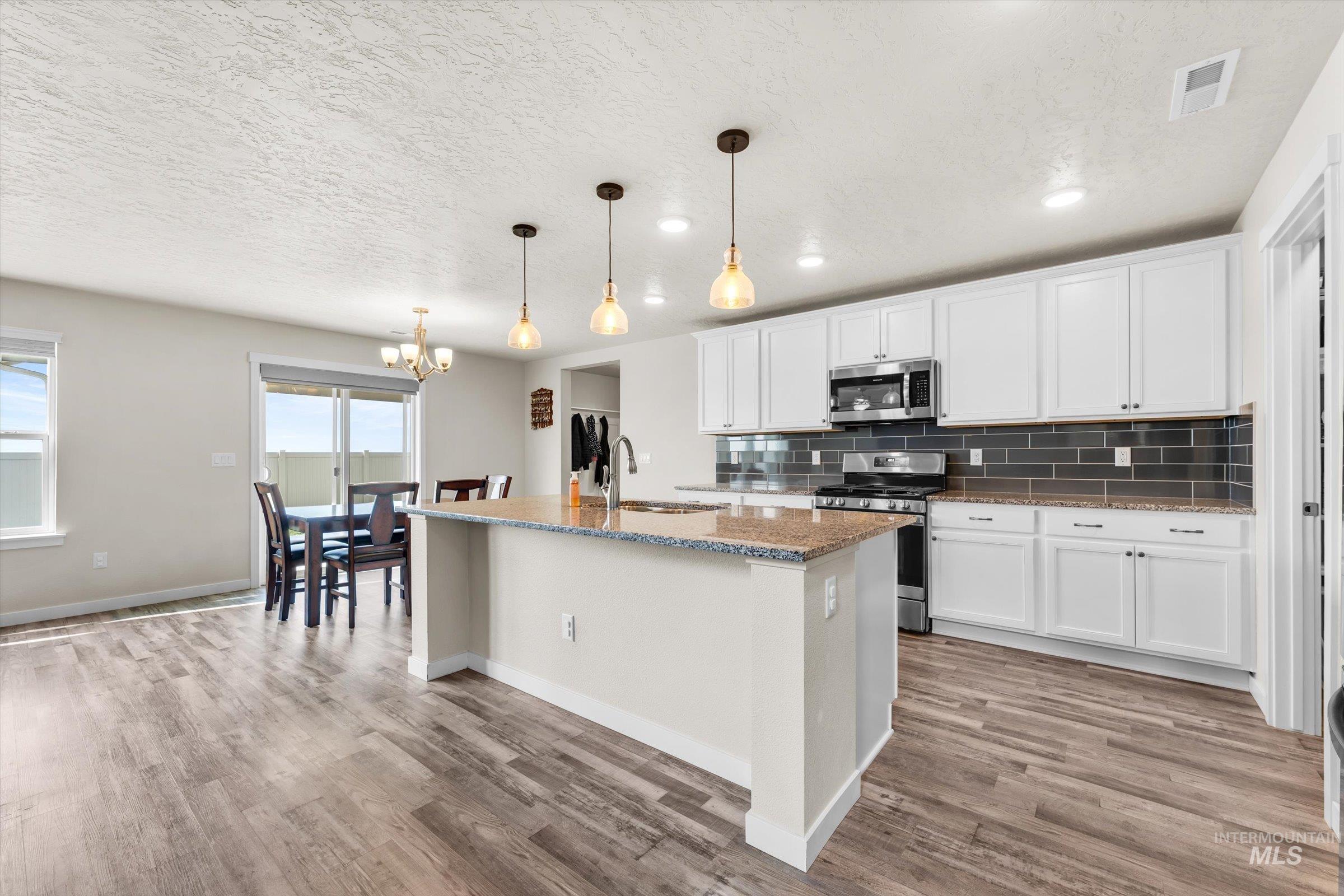 705 SW Raelynn St, Mountain Home, Idaho 83647, 4 Bedrooms, 2.5 Bathrooms, Residential For Sale, Price $465,000,MLS 98982988