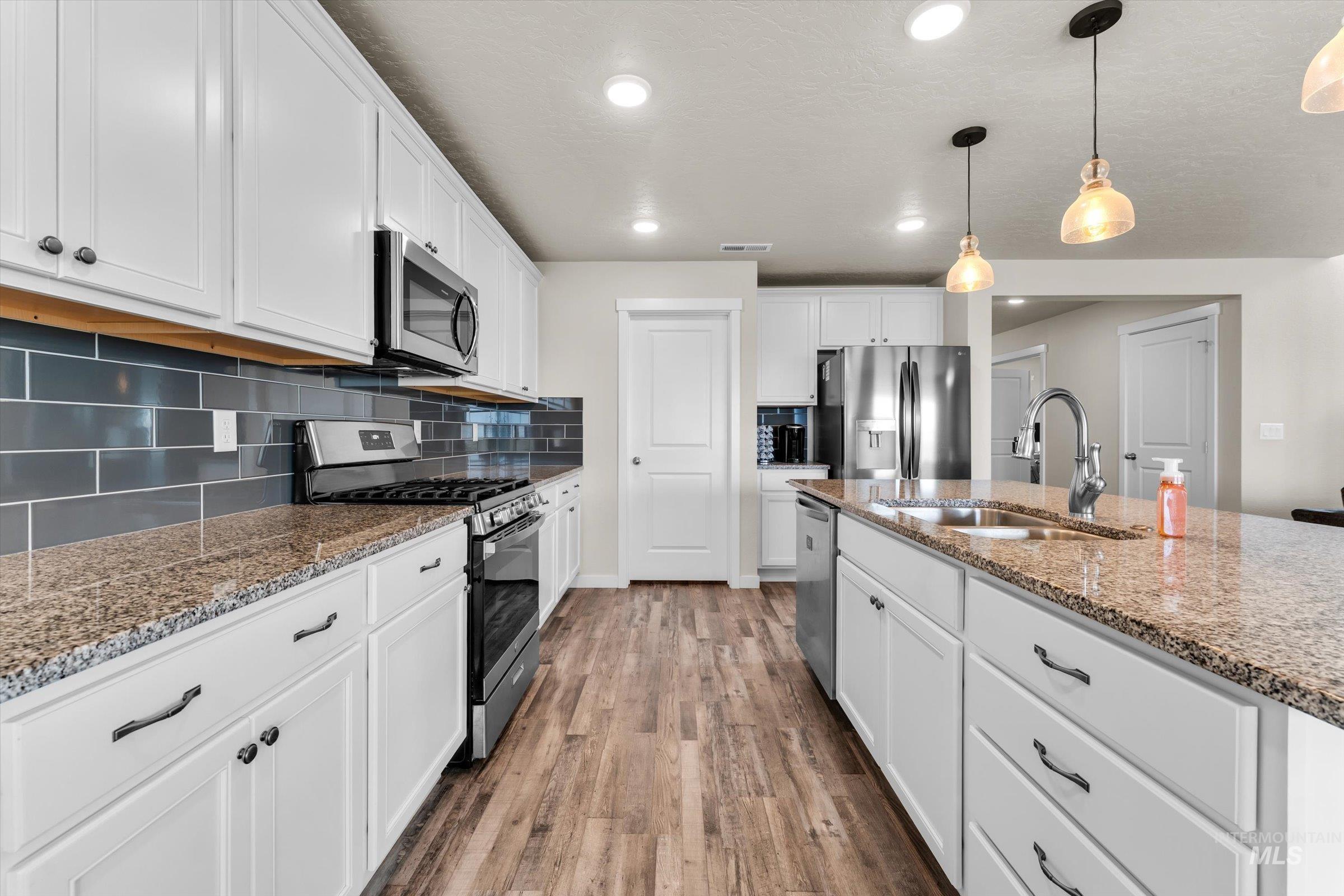 705 SW Raelynn St, Mountain Home, Idaho 83647, 4 Bedrooms, 2.5 Bathrooms, Residential For Sale, Price $465,000,MLS 98982988