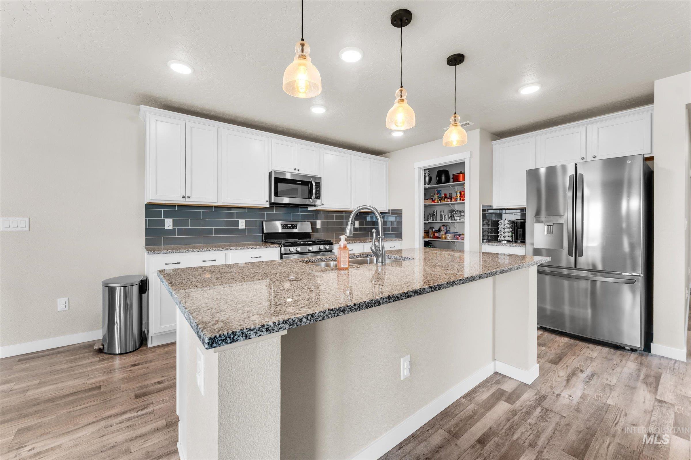 705 SW Raelynn St, Mountain Home, Idaho 83647, 4 Bedrooms, 2.5 Bathrooms, Residential For Sale, Price $465,000,MLS 98982988