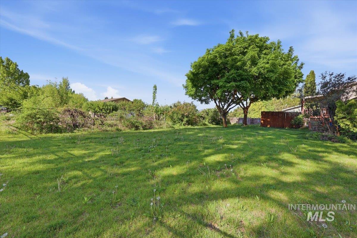 10883 W Reutzel Dr., Boise, Idaho 83709, 4 Bedrooms, 2 Bathrooms, Residential For Sale, Price $399,000,MLS 98984301